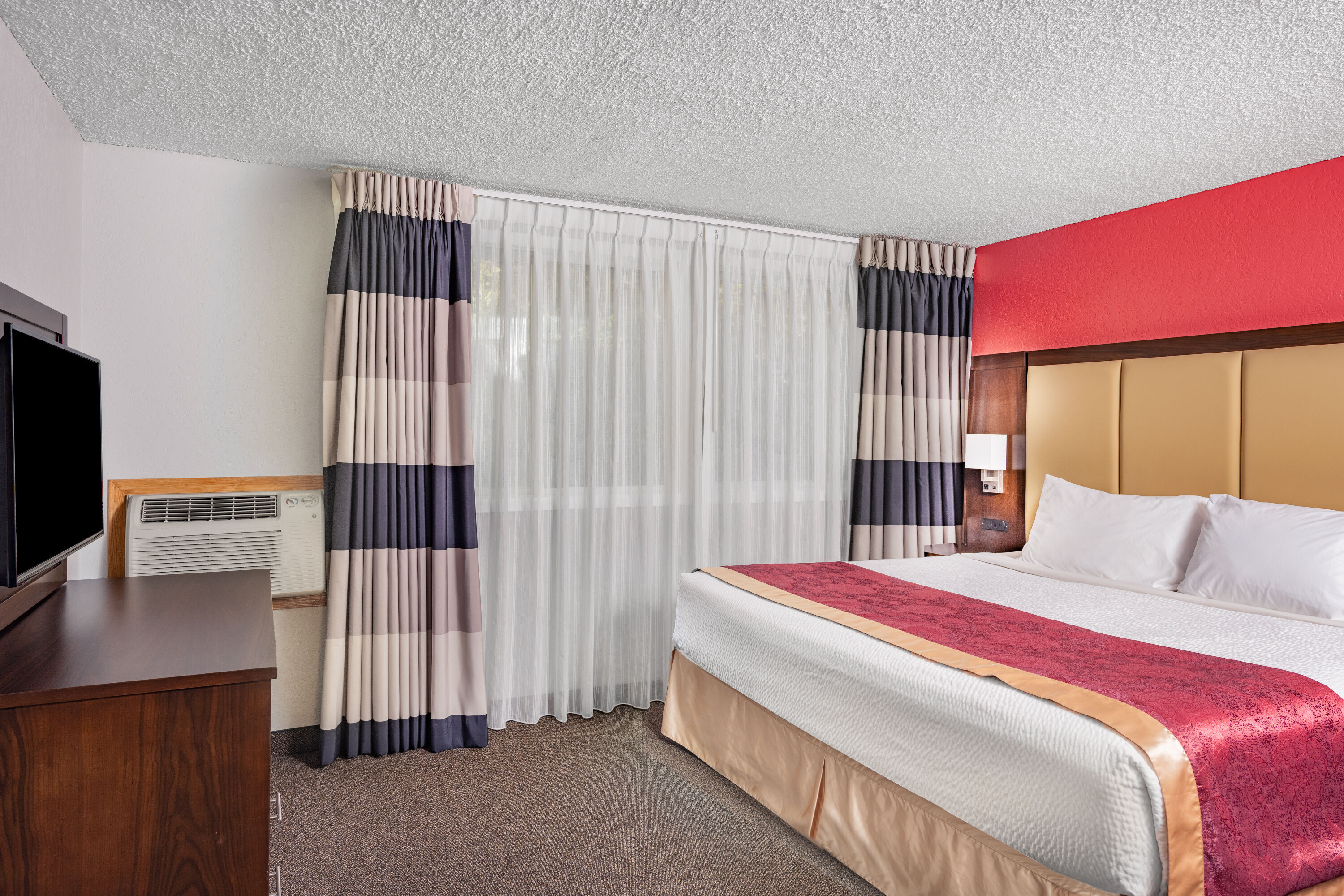 Guest room at the Ramada by Wyndham Keystone Near Mt Rushmore in Keystone, South Dakota