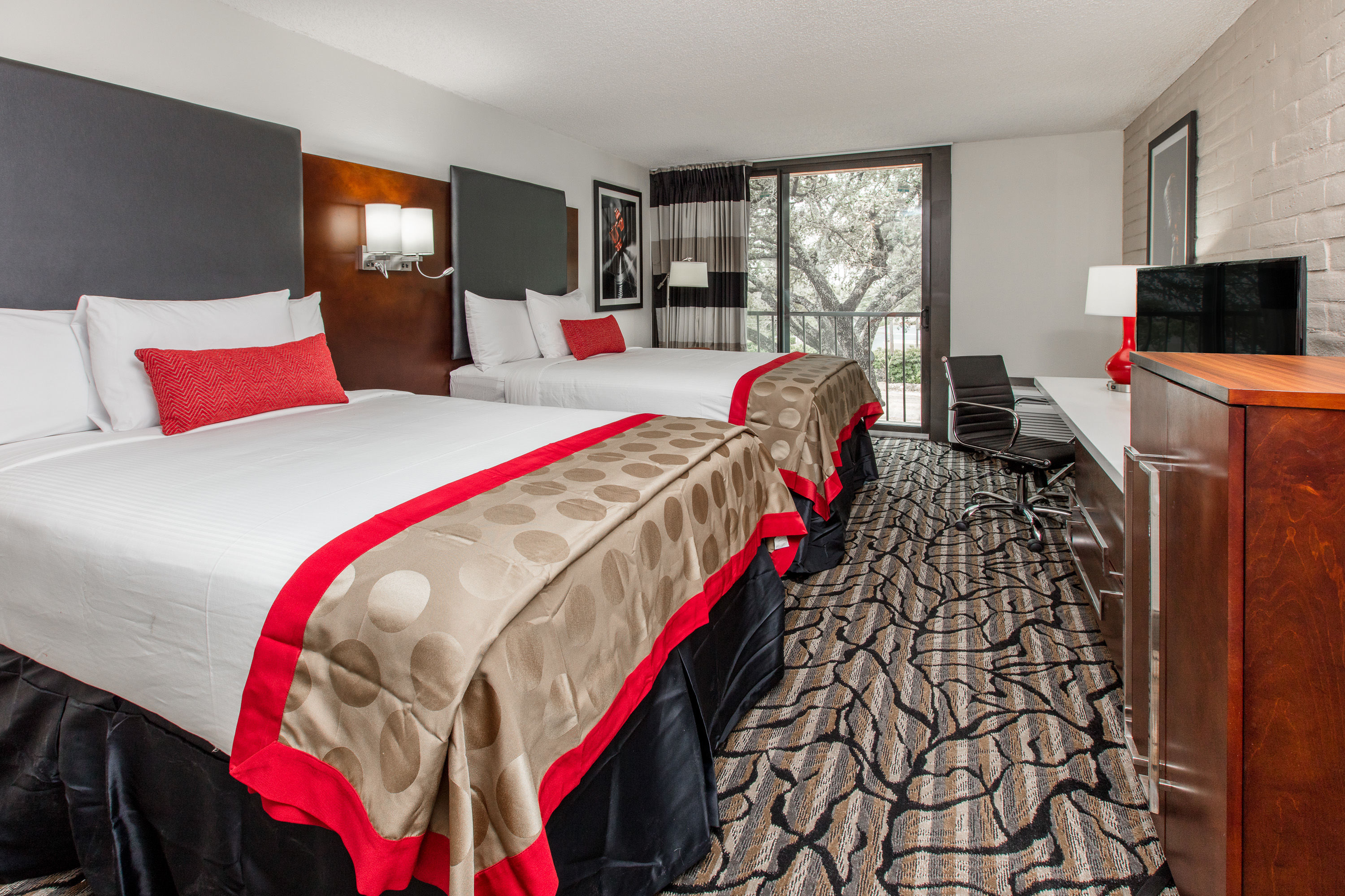 Guest room at the Ramada by Wyndham Austin South in Austin, Texas