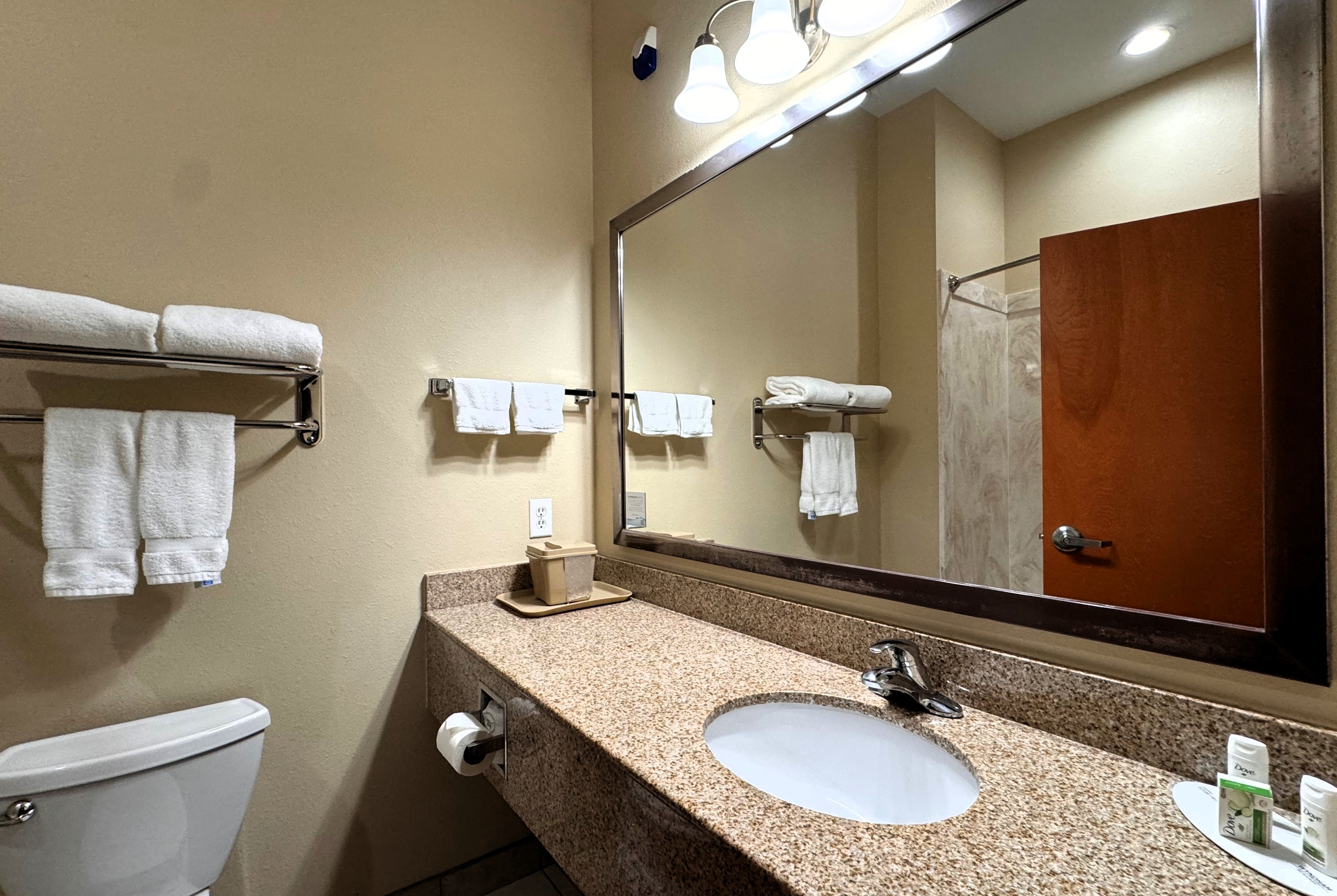 Guest room bath at the Ramada by Wyndham College Station in College Station, Texas