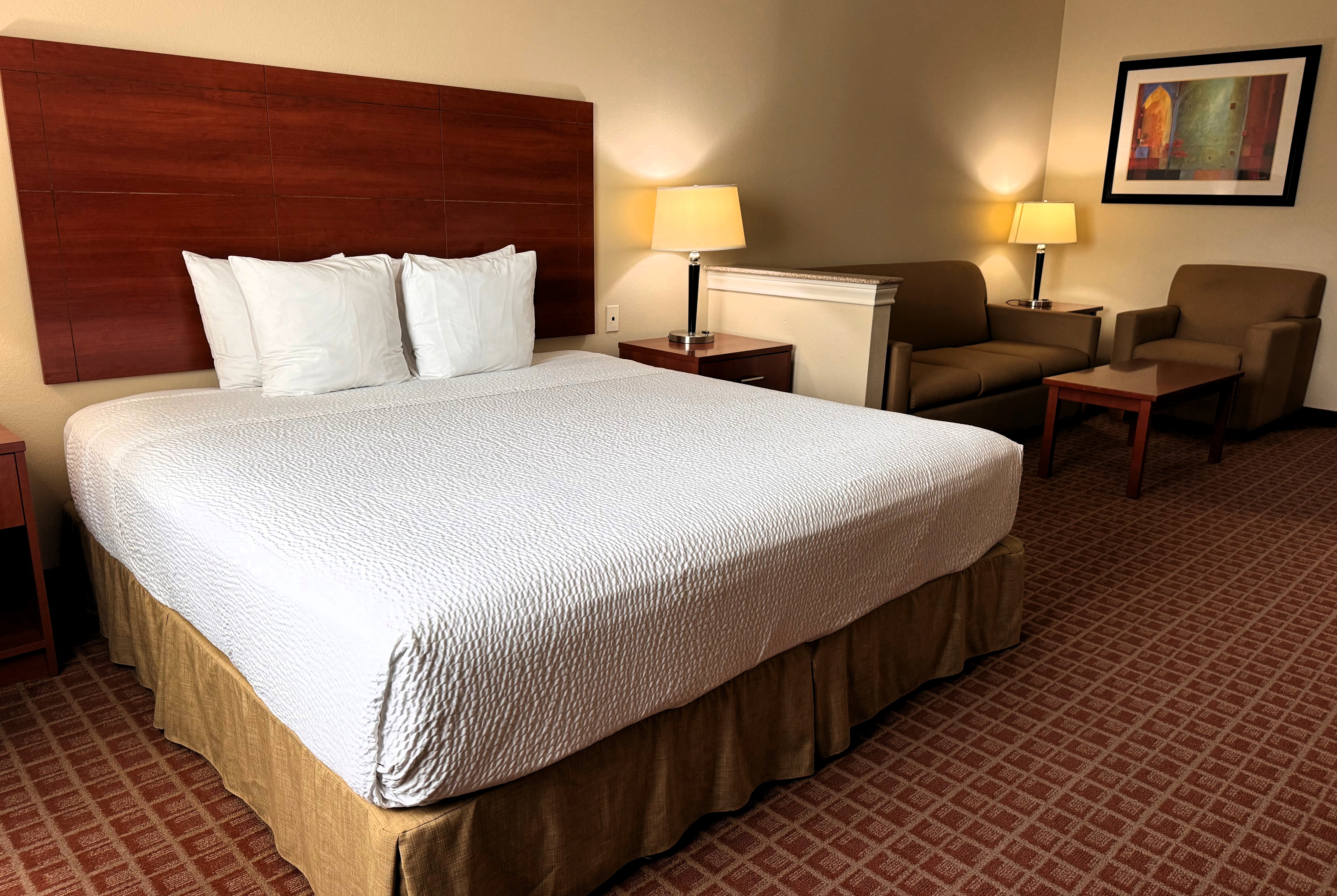 Guest room at the Ramada by Wyndham College Station in College Station, Texas