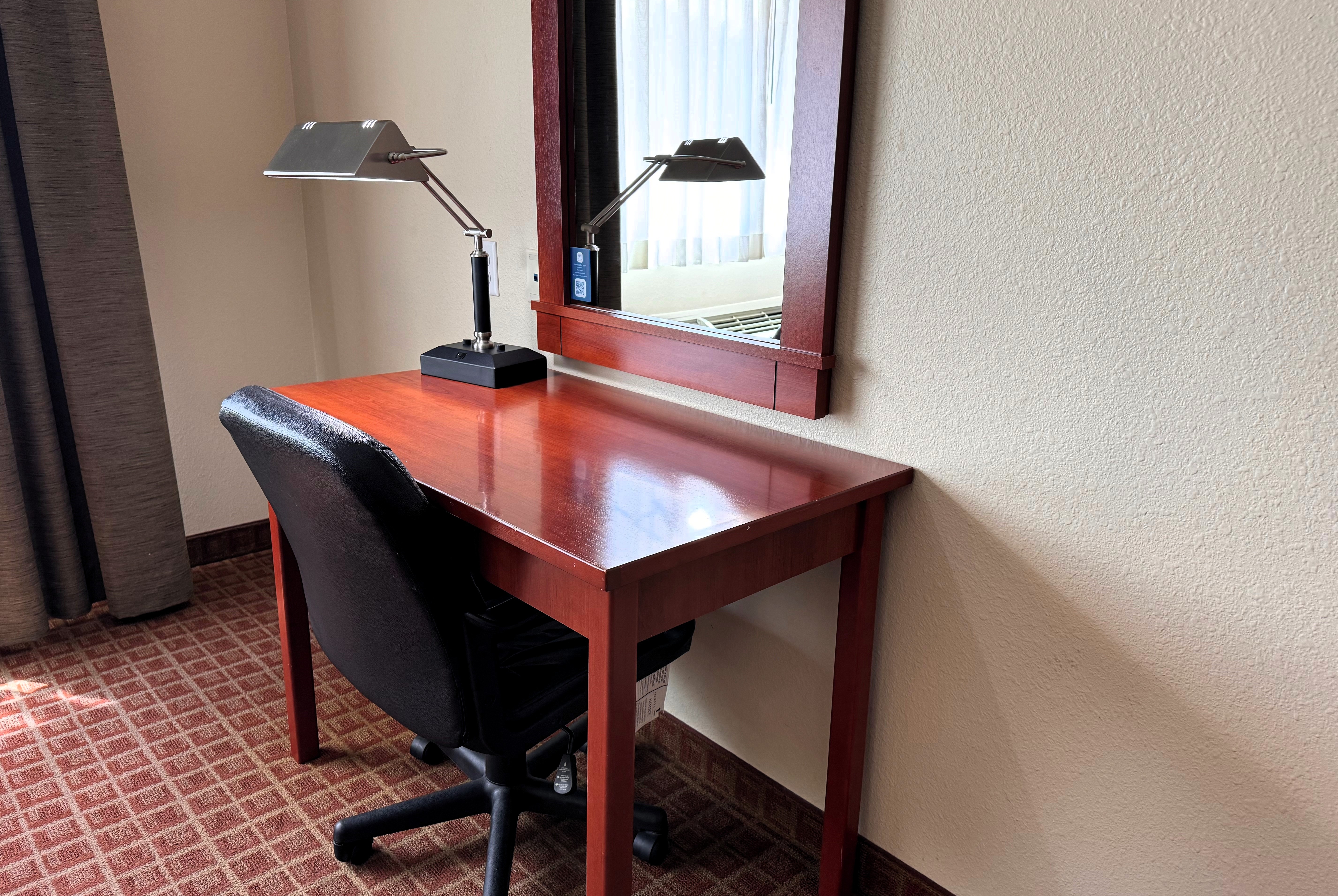 Guest room at the Ramada by Wyndham College Station in College Station, Texas