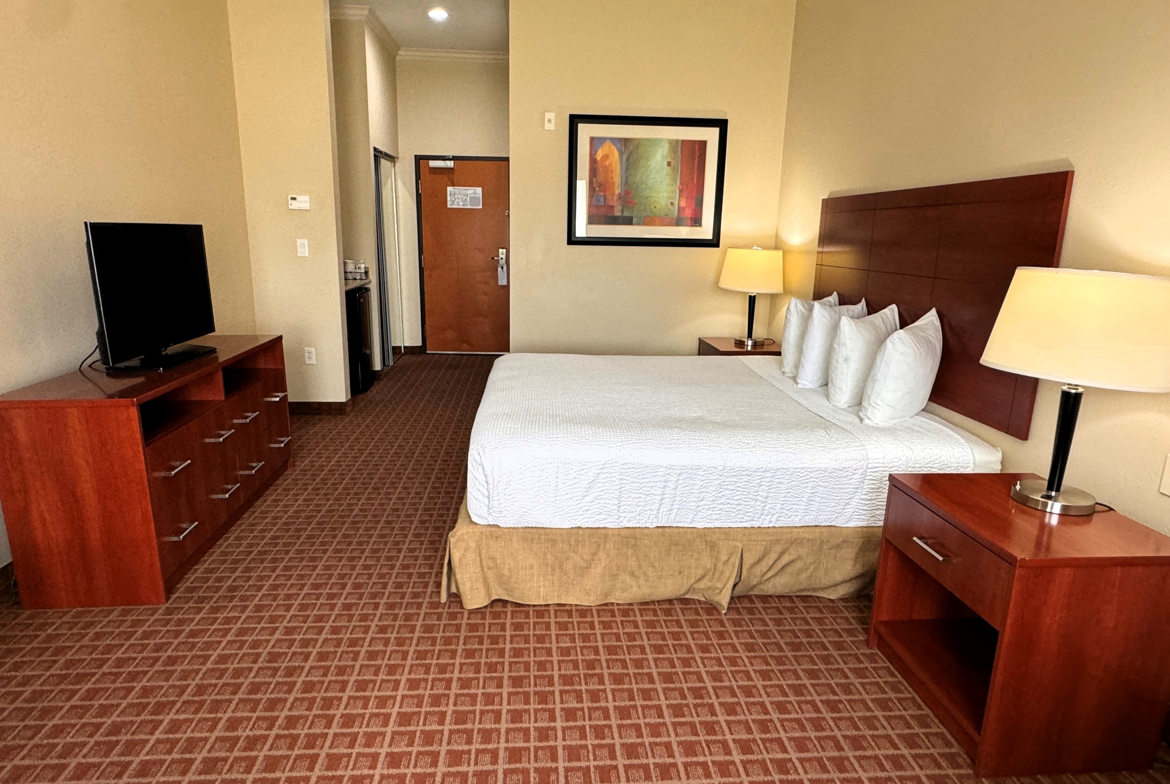 Guest room at the Ramada by Wyndham College Station in College Station, Texas