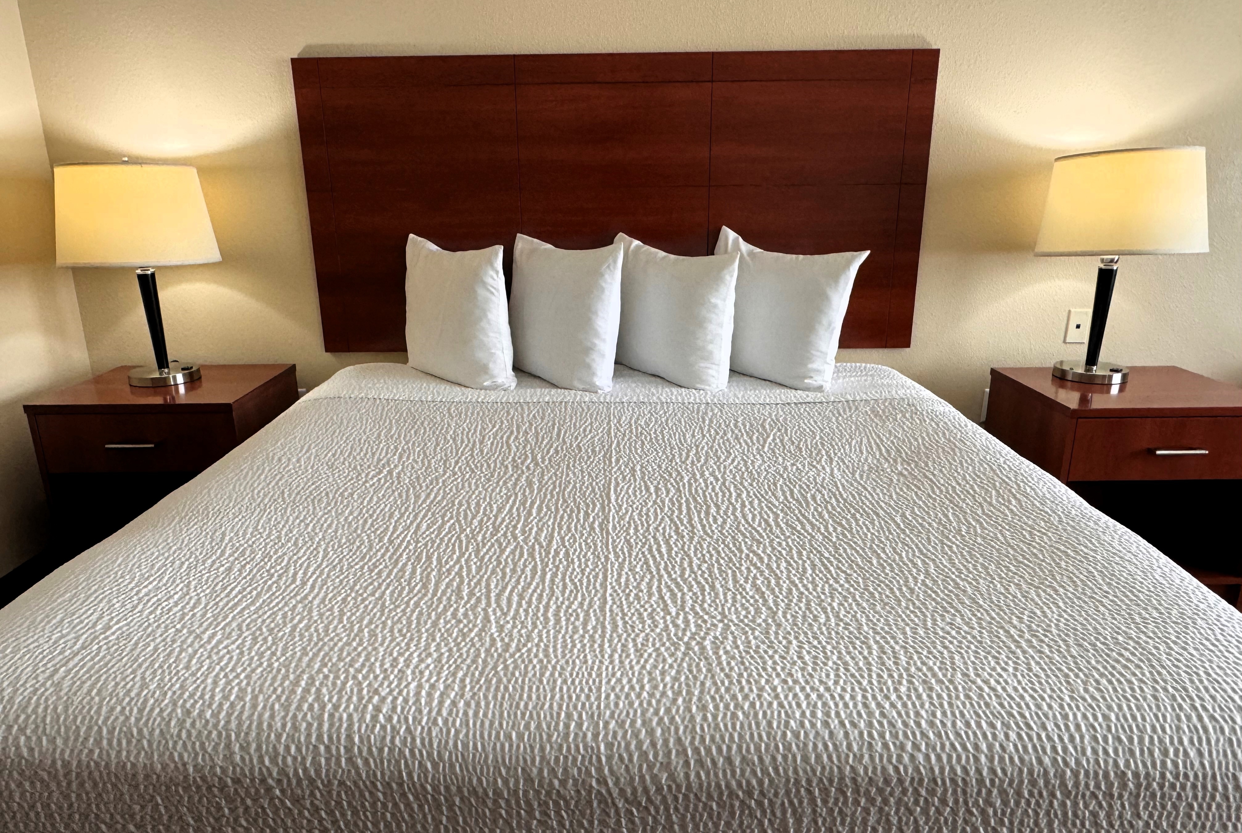 Guest room at the Ramada by Wyndham College Station in College Station, Texas