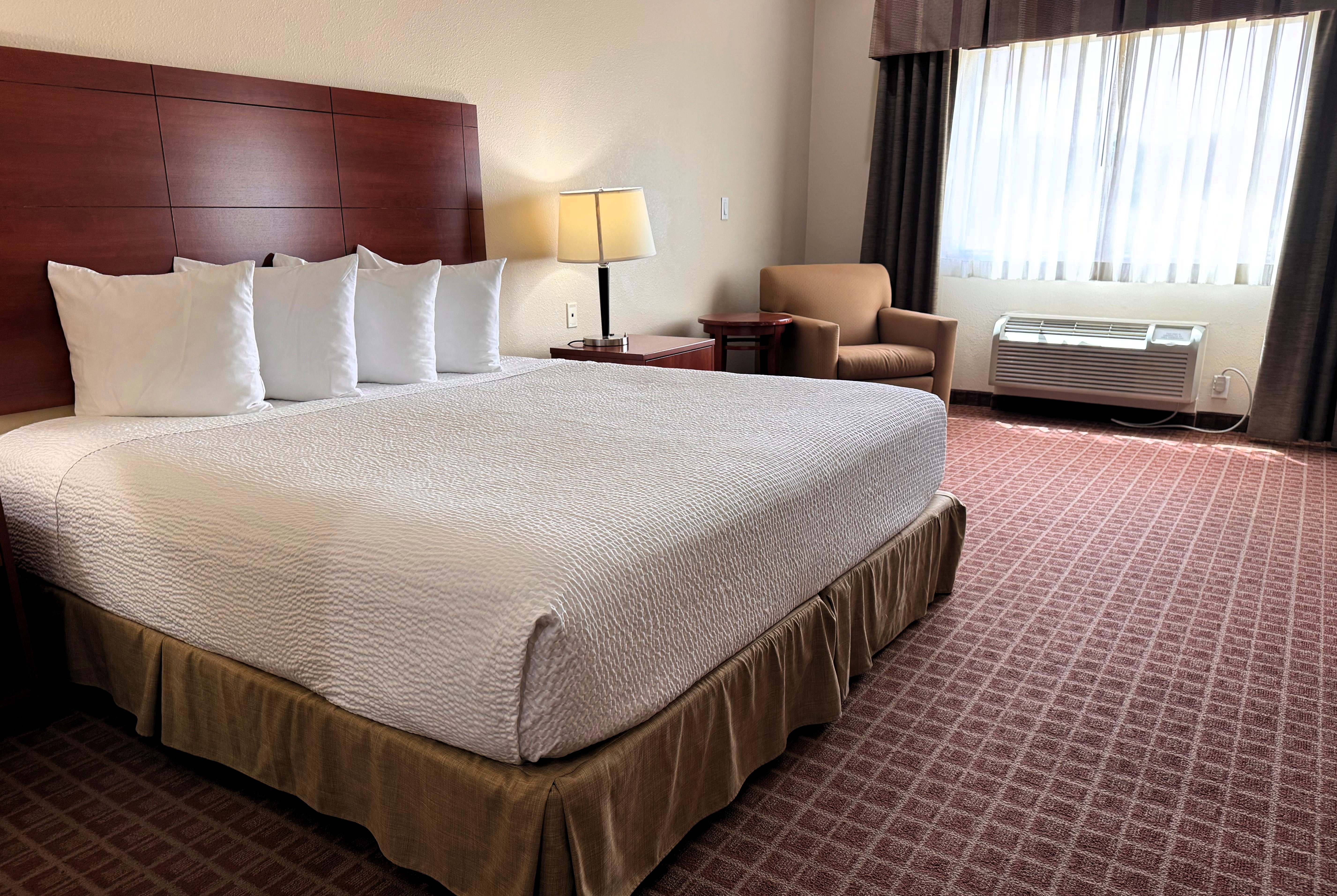 Guest room at the Ramada by Wyndham College Station in College Station, Texas