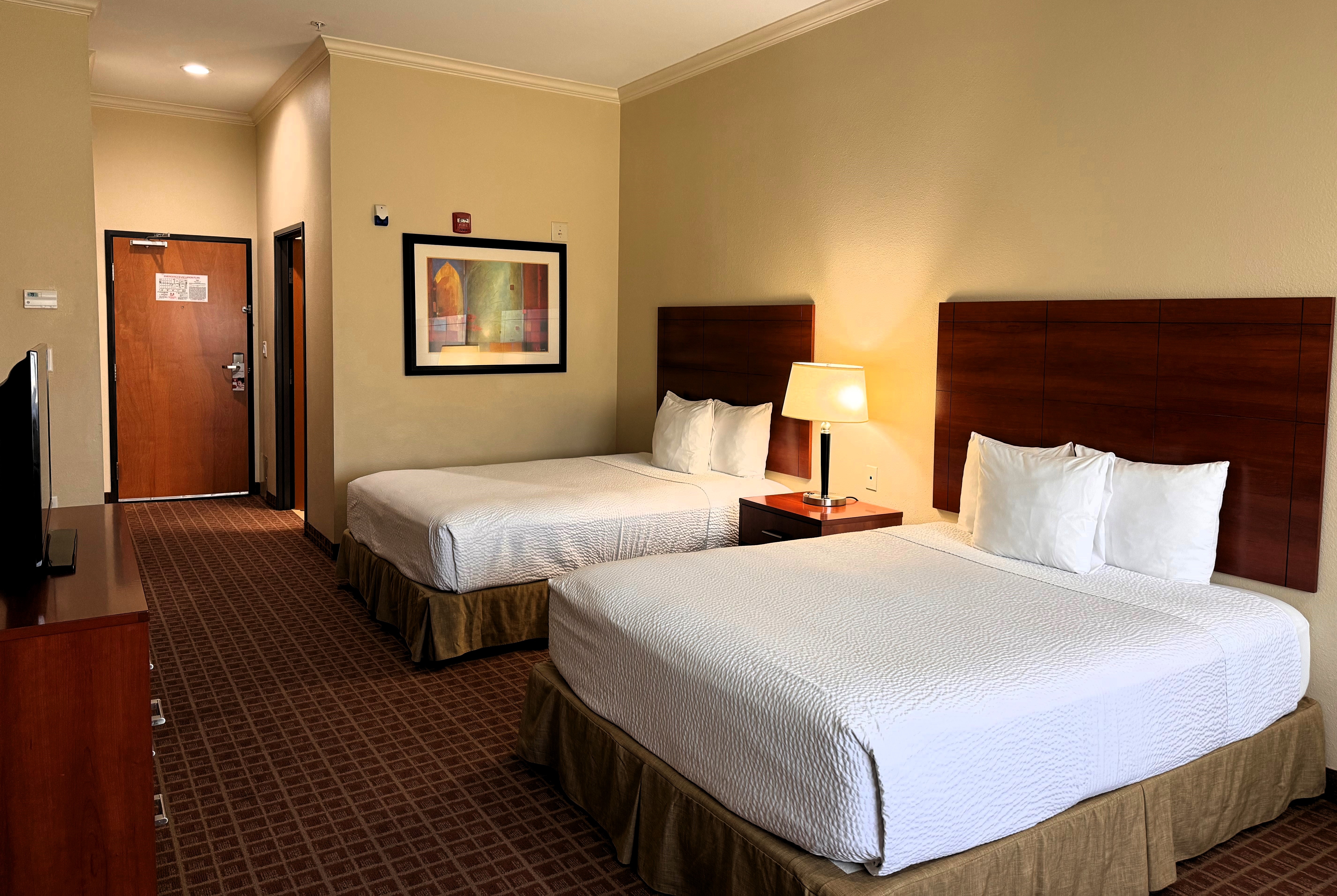 Guest room at the Ramada by Wyndham College Station in College Station, Texas