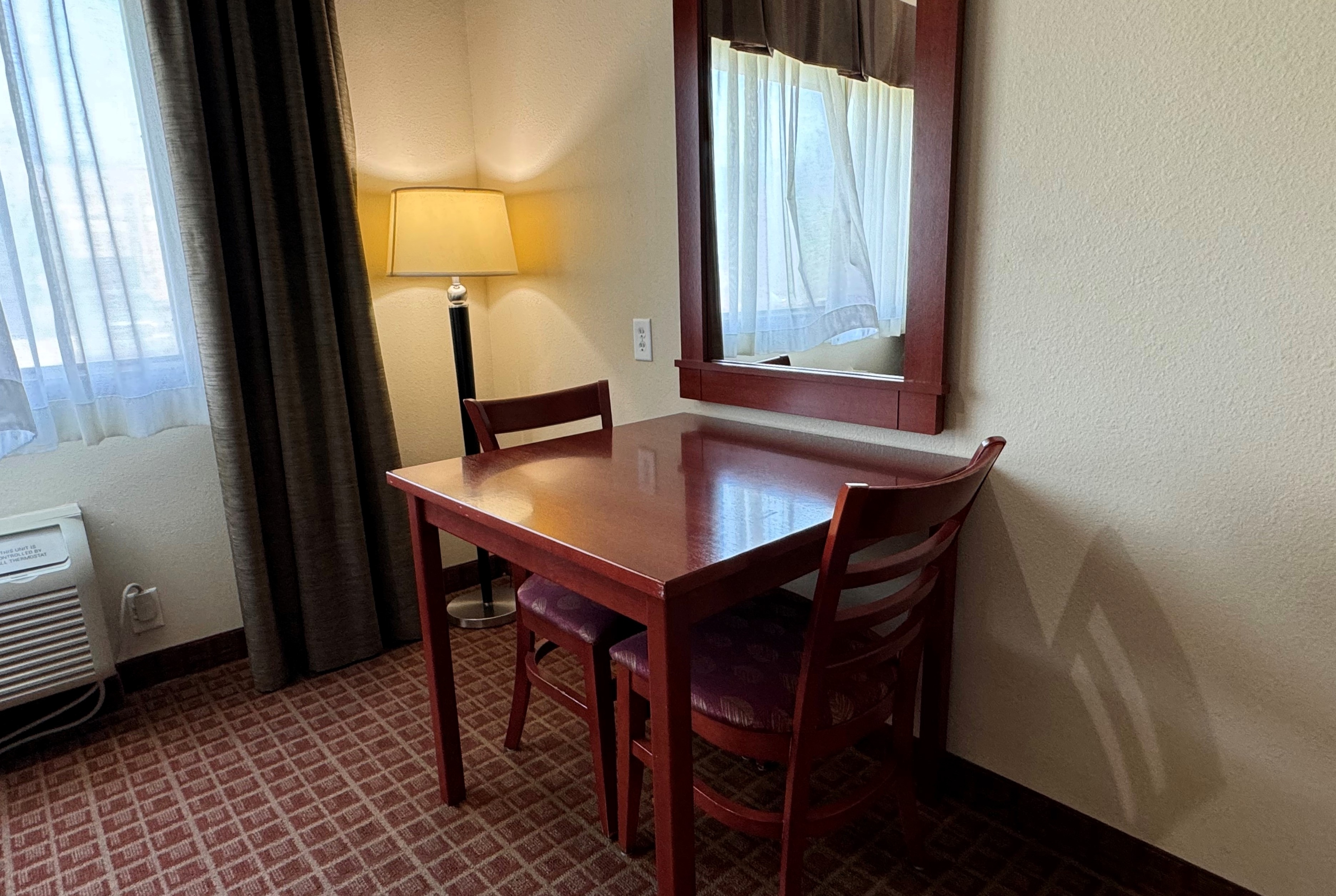 Guest room at the Ramada by Wyndham College Station in College Station, Texas