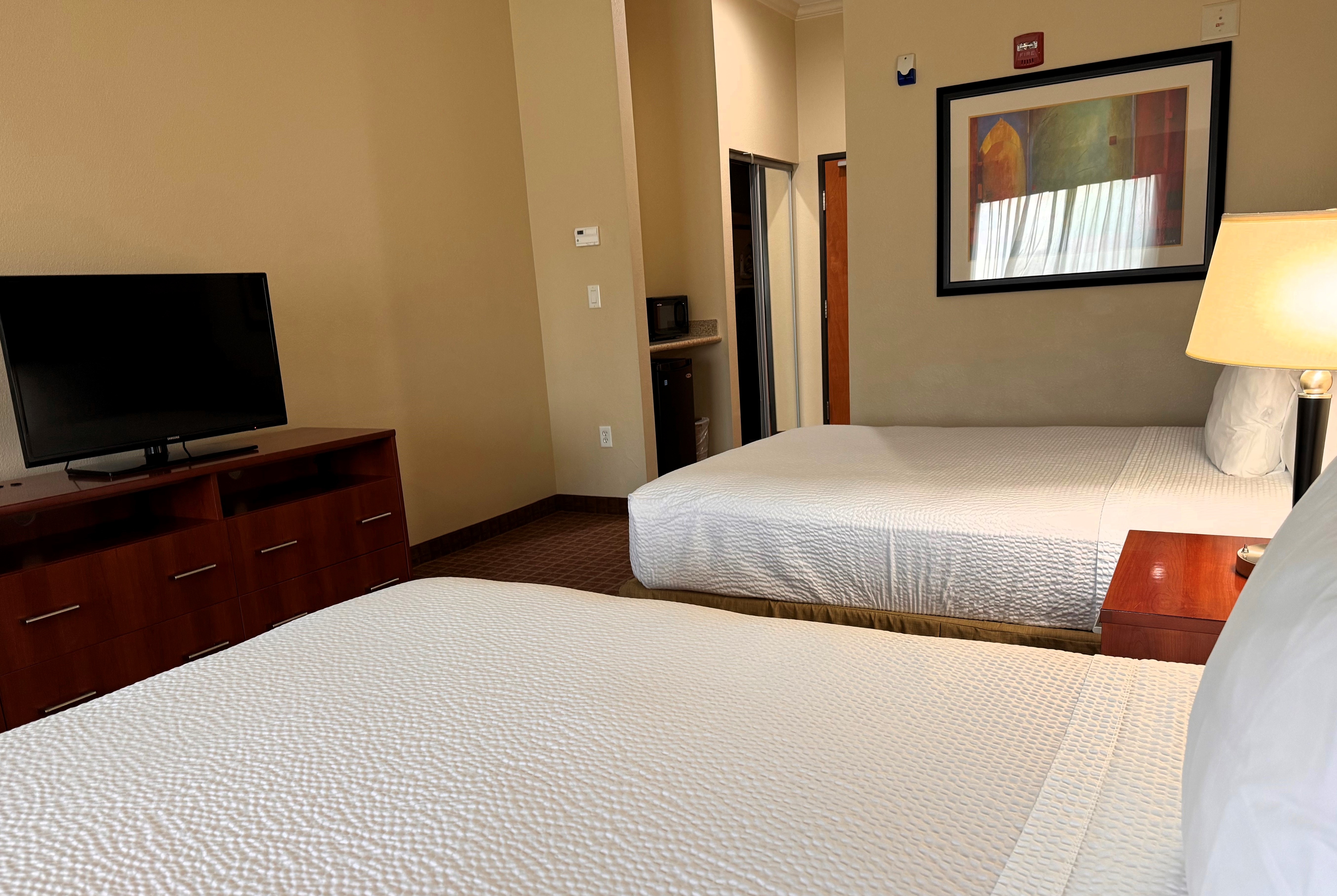 Guest room at the Ramada by Wyndham College Station in College Station, Texas