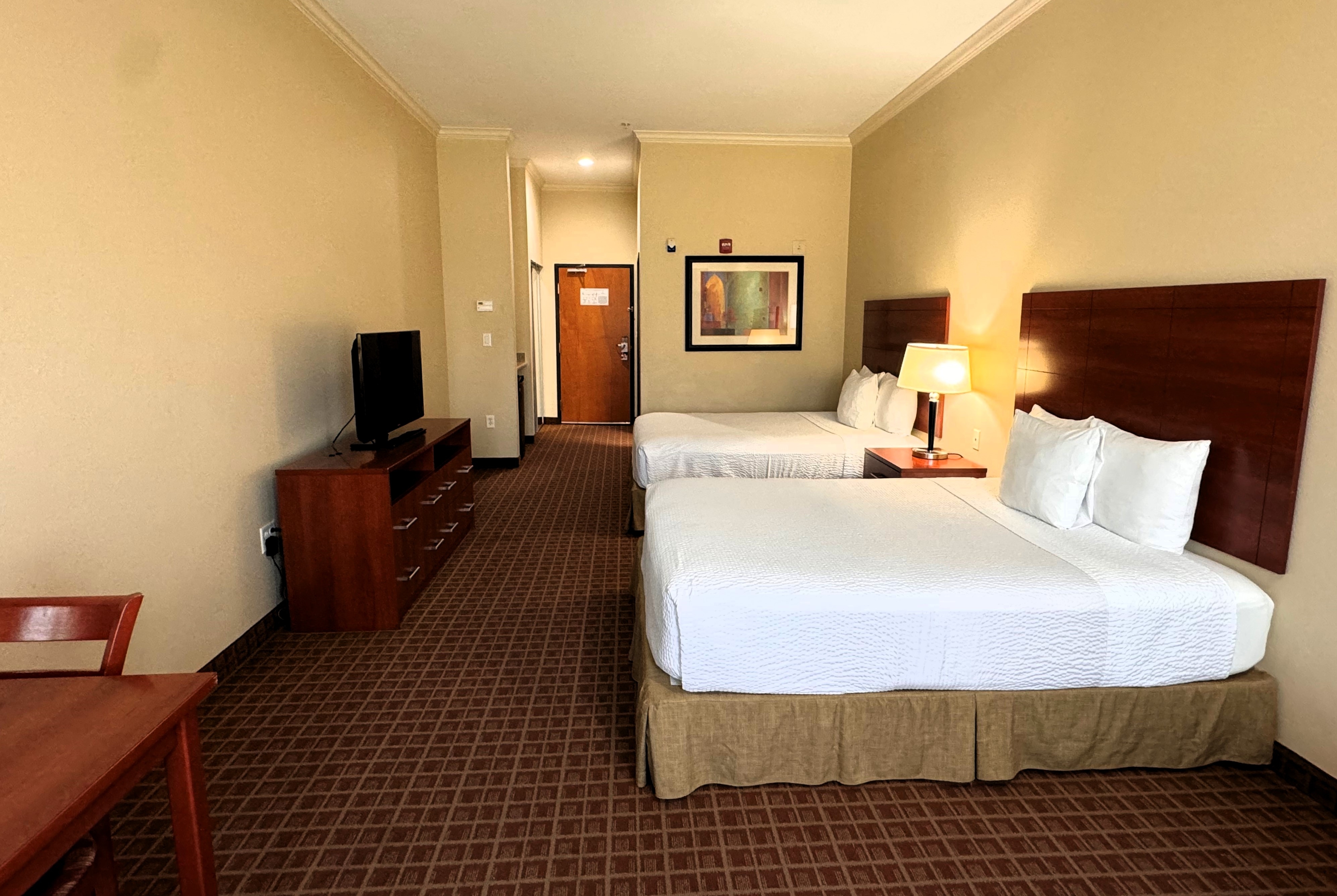 Guest room at the Ramada by Wyndham College Station in College Station, Texas