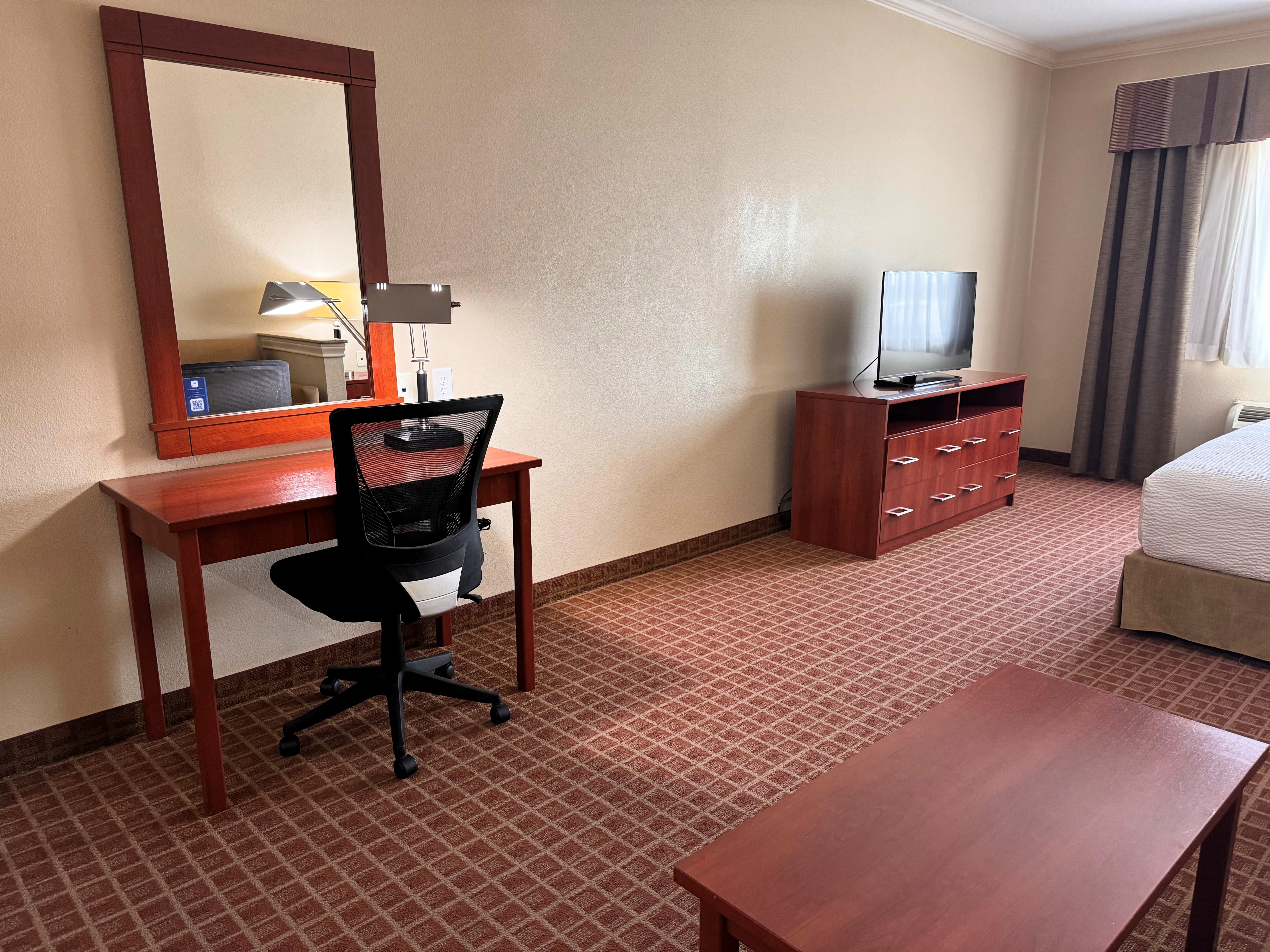 Guest room at the Ramada by Wyndham College Station in College Station, Texas