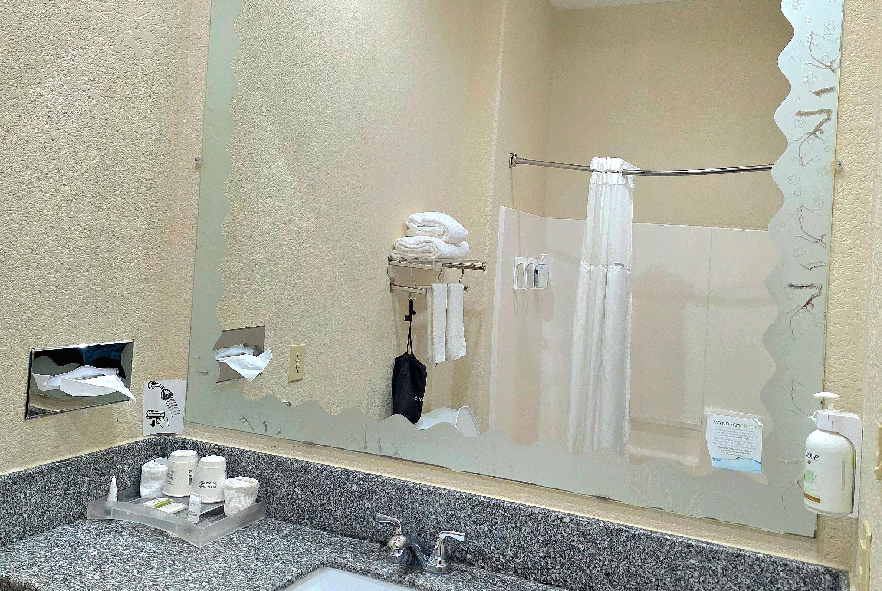 Guest room bath at the Ramada by Wyndham South Waco in Hewitt, Texas