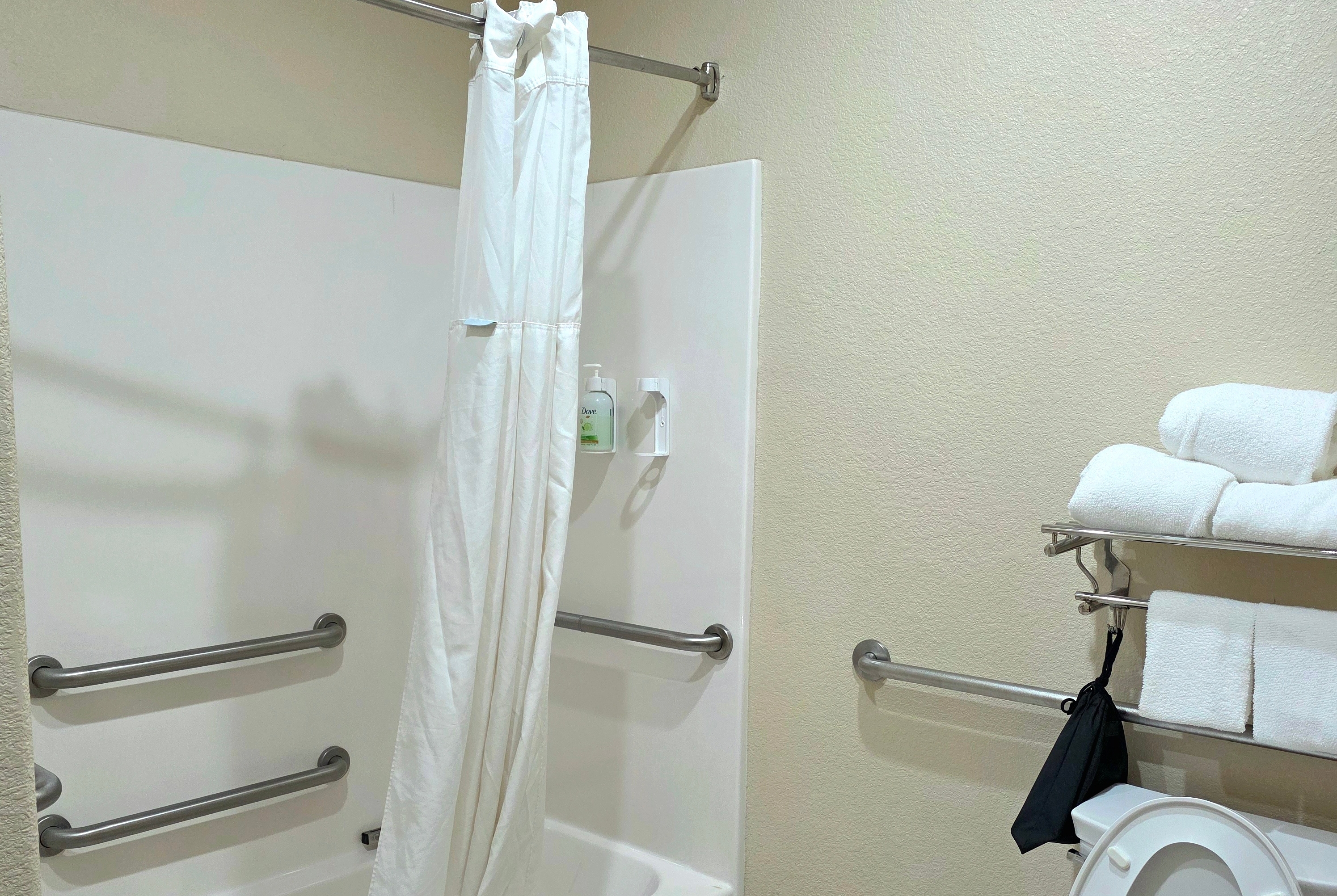 Guest room bath at the Ramada by Wyndham South Waco in Hewitt, Texas