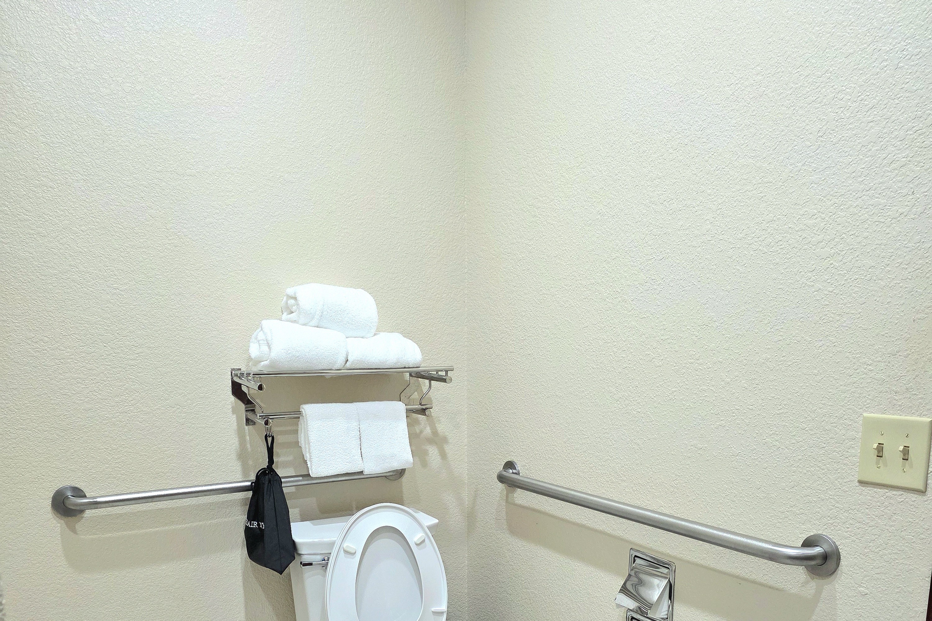 Guest room bath at the Ramada by Wyndham South Waco in Hewitt, Texas