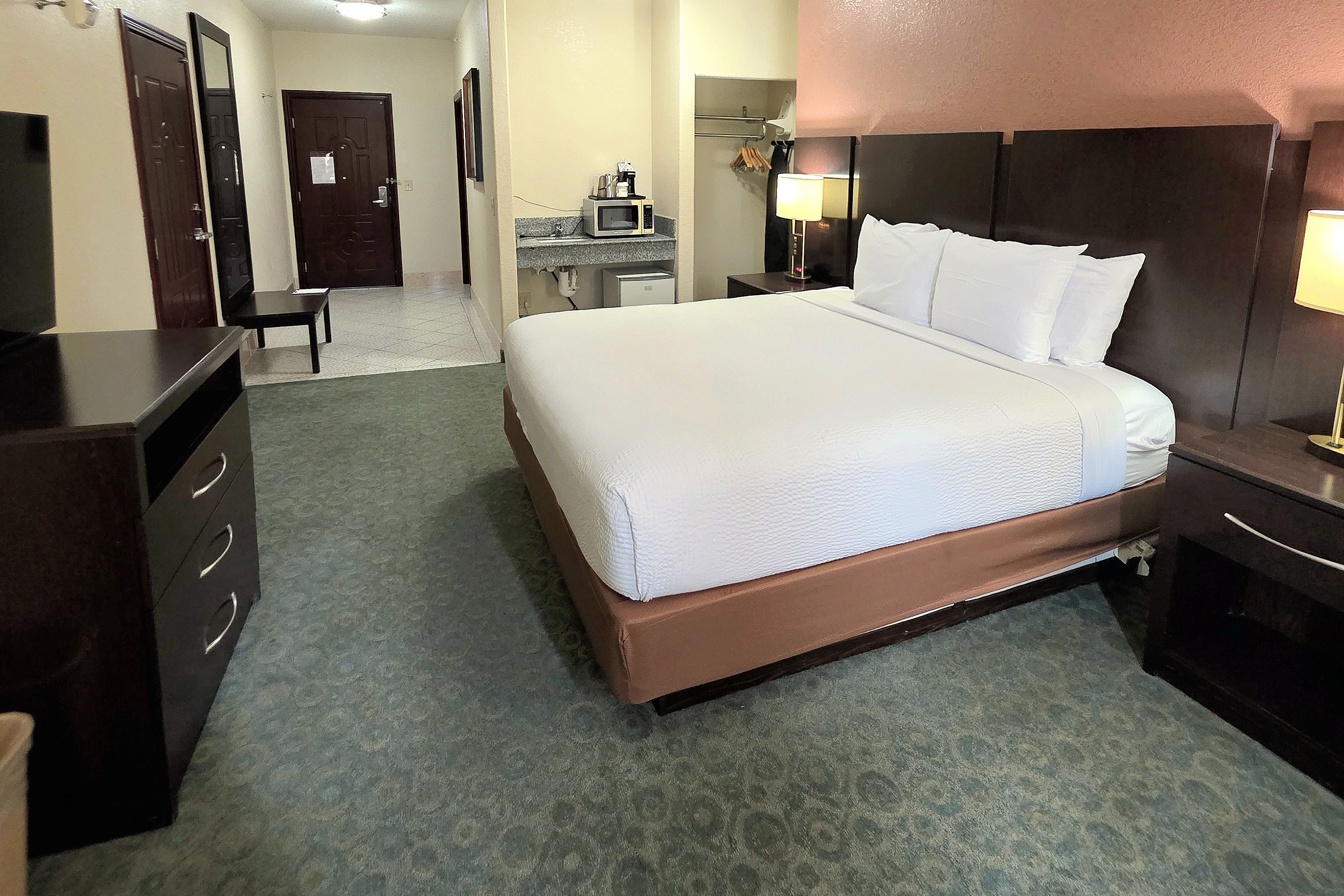 Guest room at the Ramada by Wyndham South Waco in Hewitt, Texas