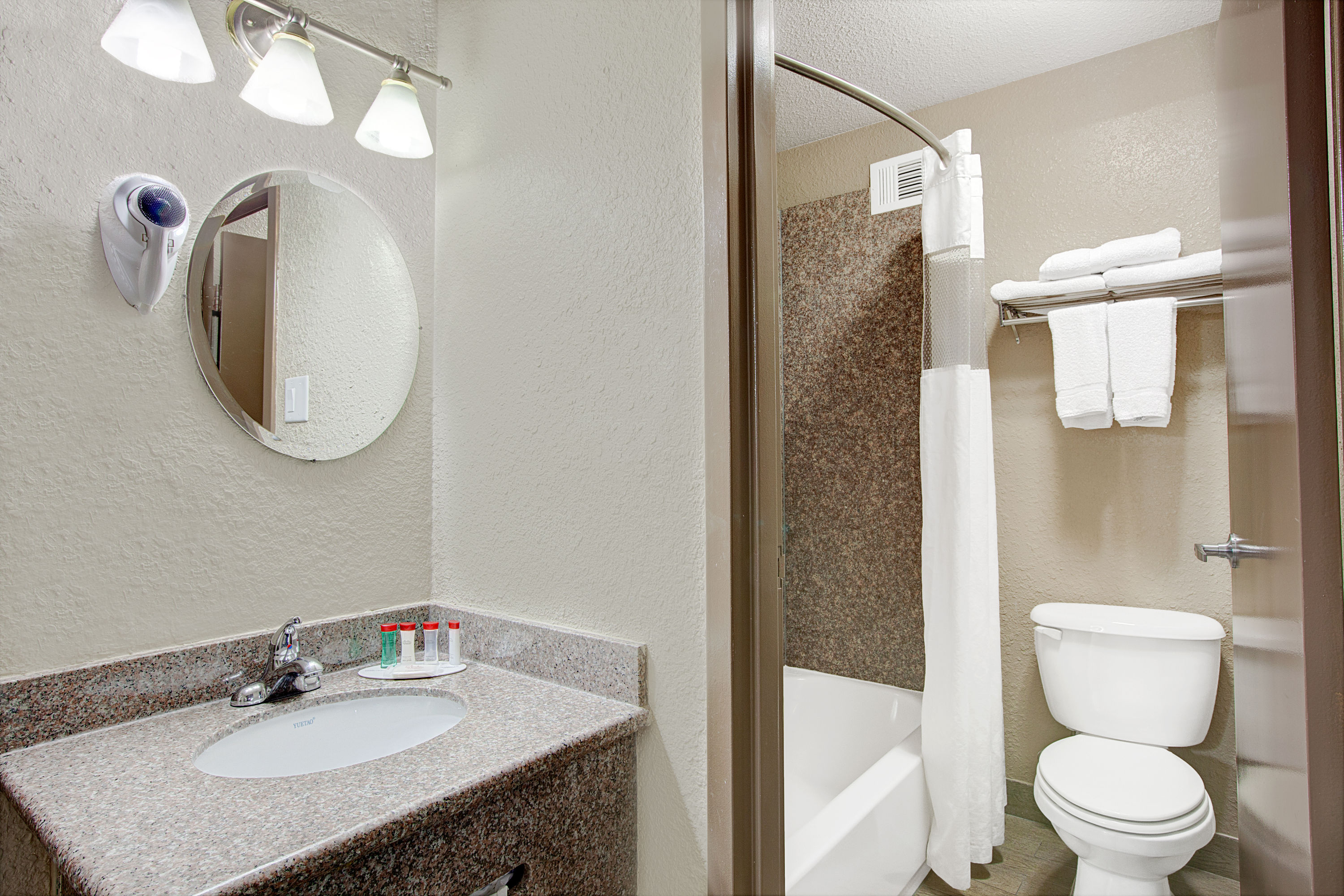 Guest room at the Ramada by Wyndham Houston Intercontinental Airport South in Houston, Texas