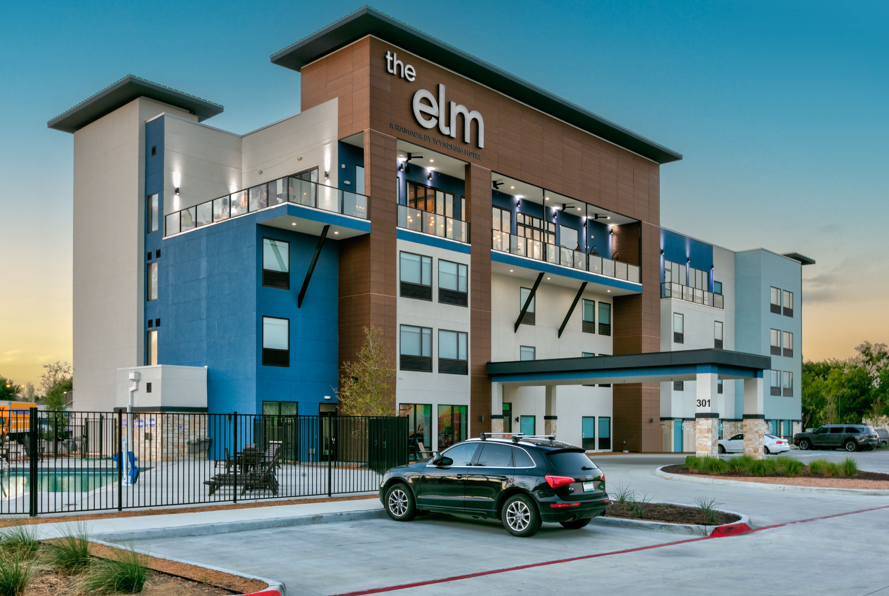 Exterior Dusk Image of The Elm, a Ramada by Wyndham hotel in Little Elm, Texas
