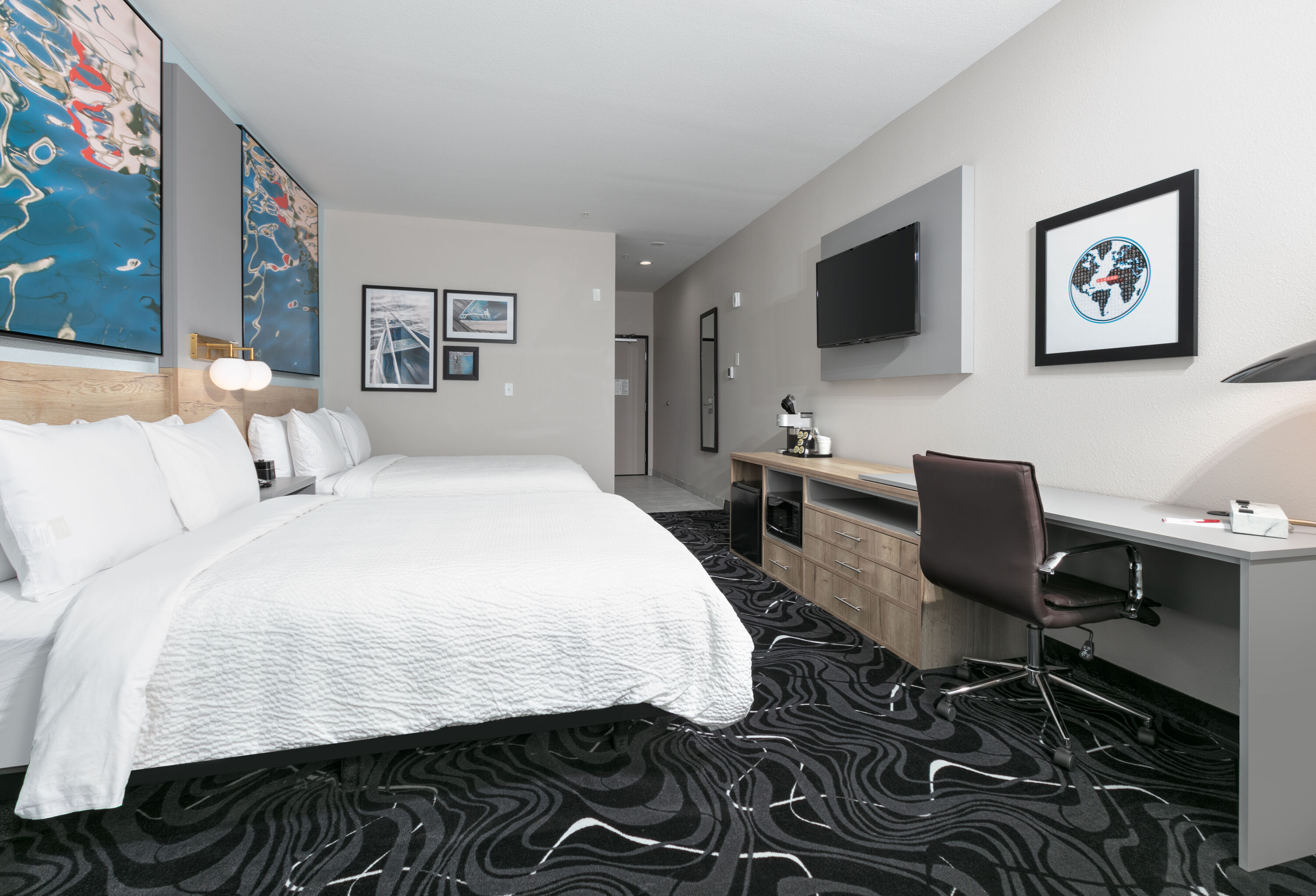 Guest room at the The Elm, a Ramada by Wyndham in Little Elm, Texas