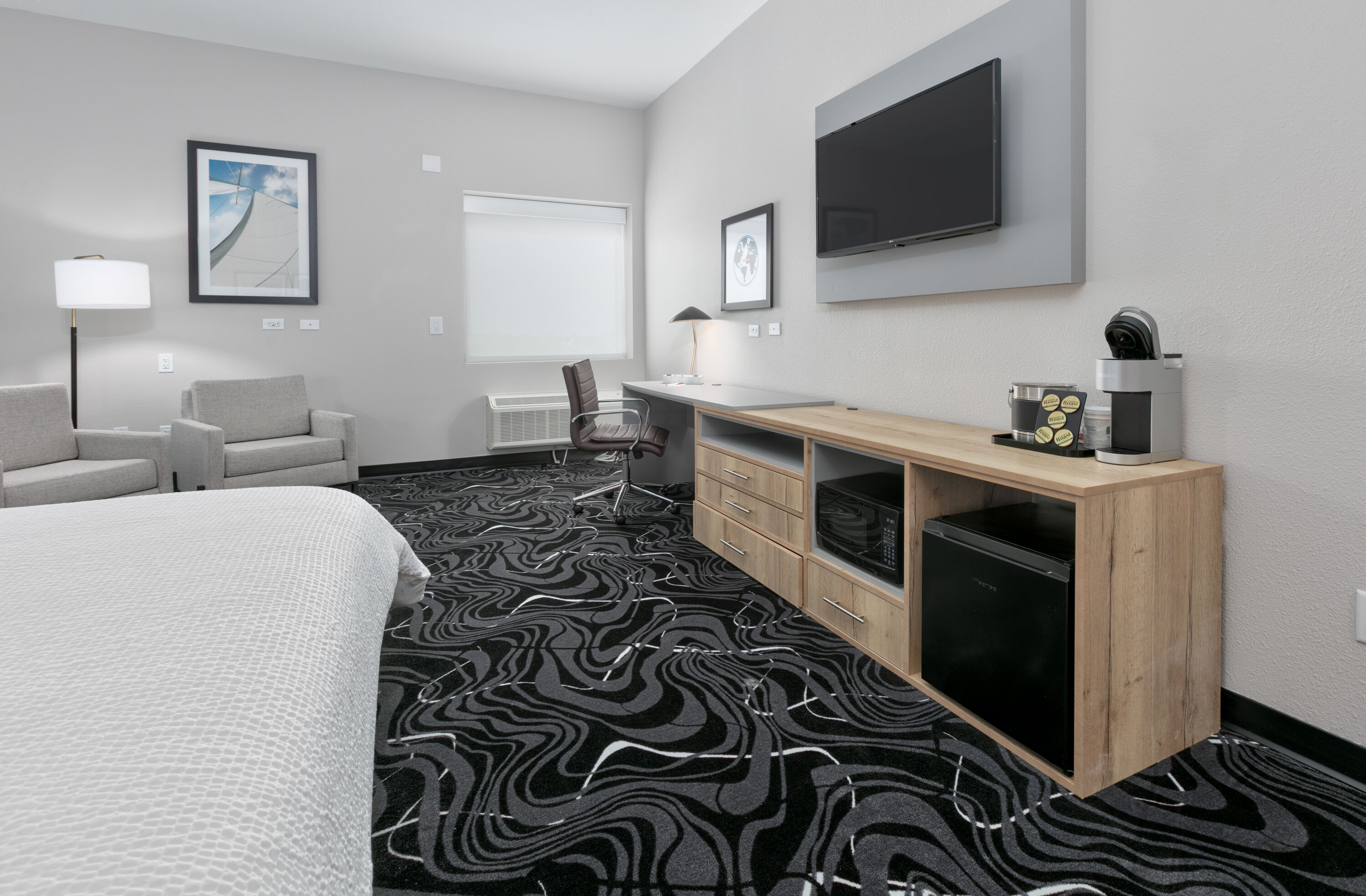 Guest room at the The Elm, a Ramada by Wyndham in Little Elm, Texas