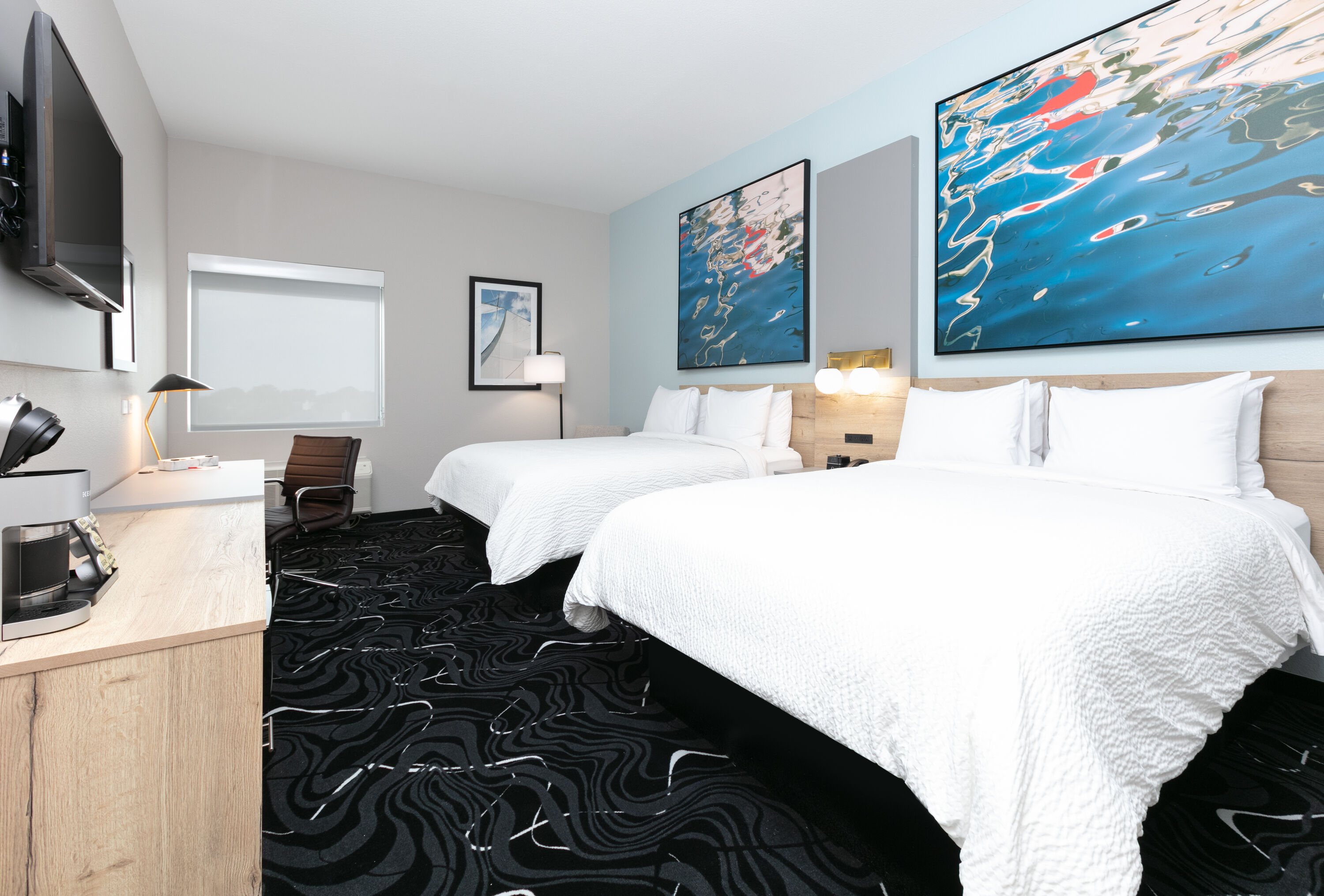 Guest room at the The Elm, a Ramada by Wyndham in Little Elm, Texas