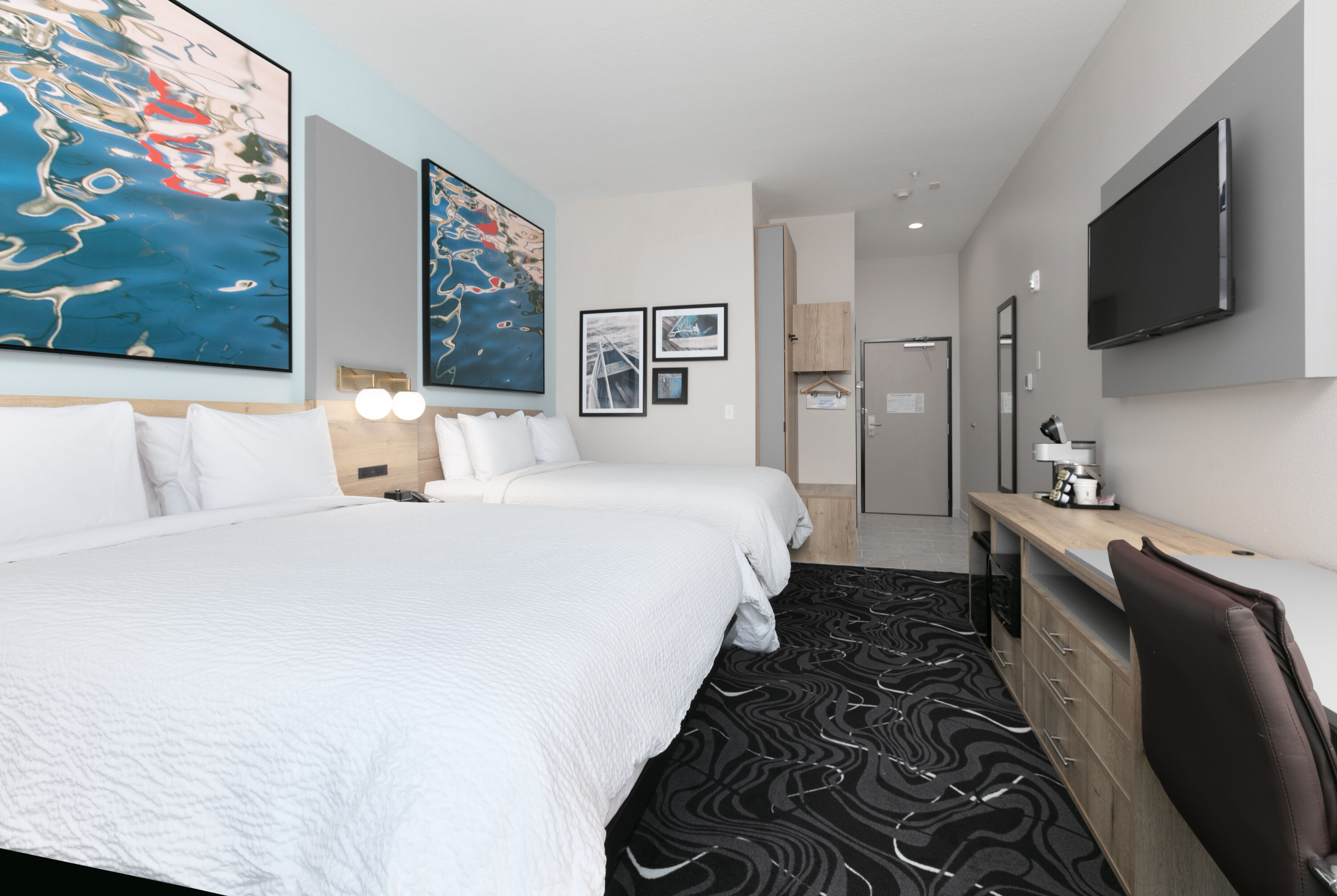 Guest room at the The Elm, a Ramada by Wyndham in Little Elm, Texas