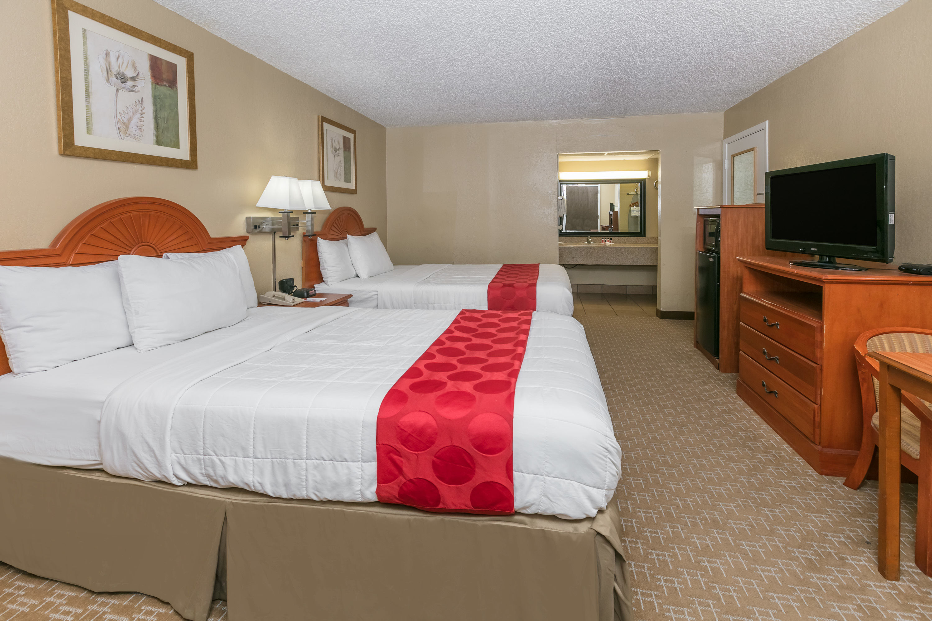Guest room at the Ramada by Wyndham Odessa Near University of Texas Permian in Odessa, Texas