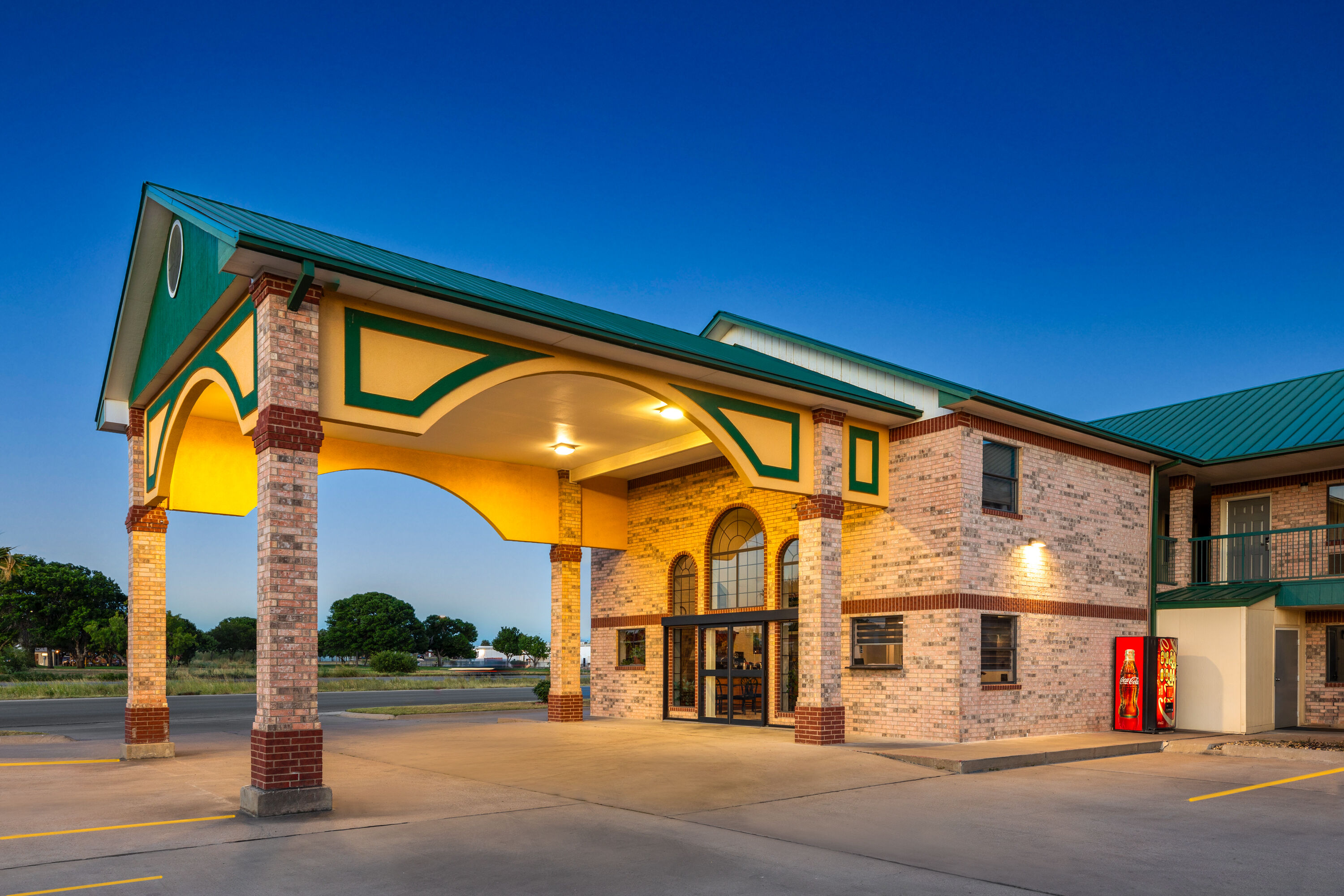 Exterior Dusk Image of Ramada Limited San Angelo hotel in San Angelo, Texas