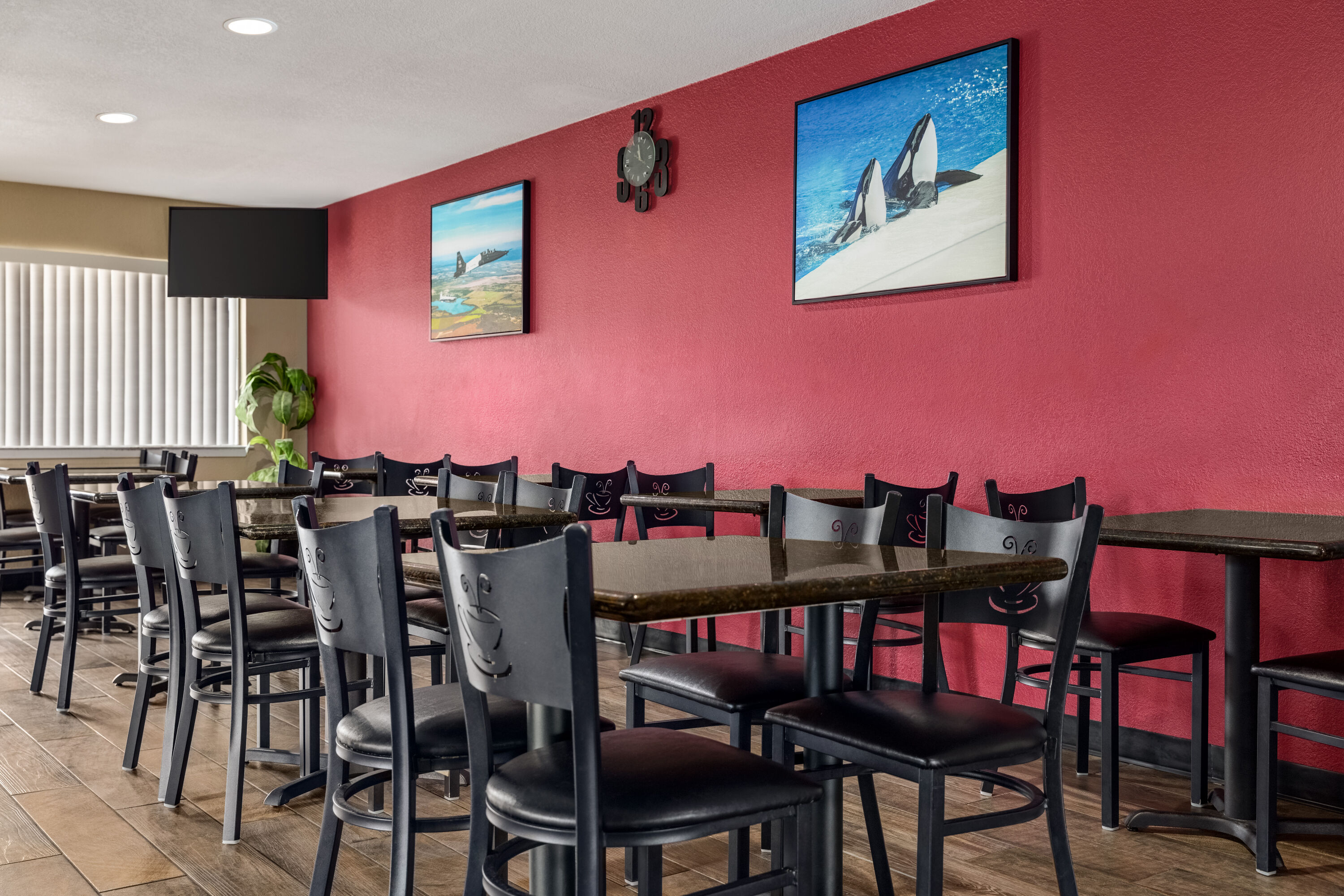Ramada by Wyndham San Antonio Near SeaWorld/Lackland AFB restaurant breakfast area with seating in San Antonio, Texas