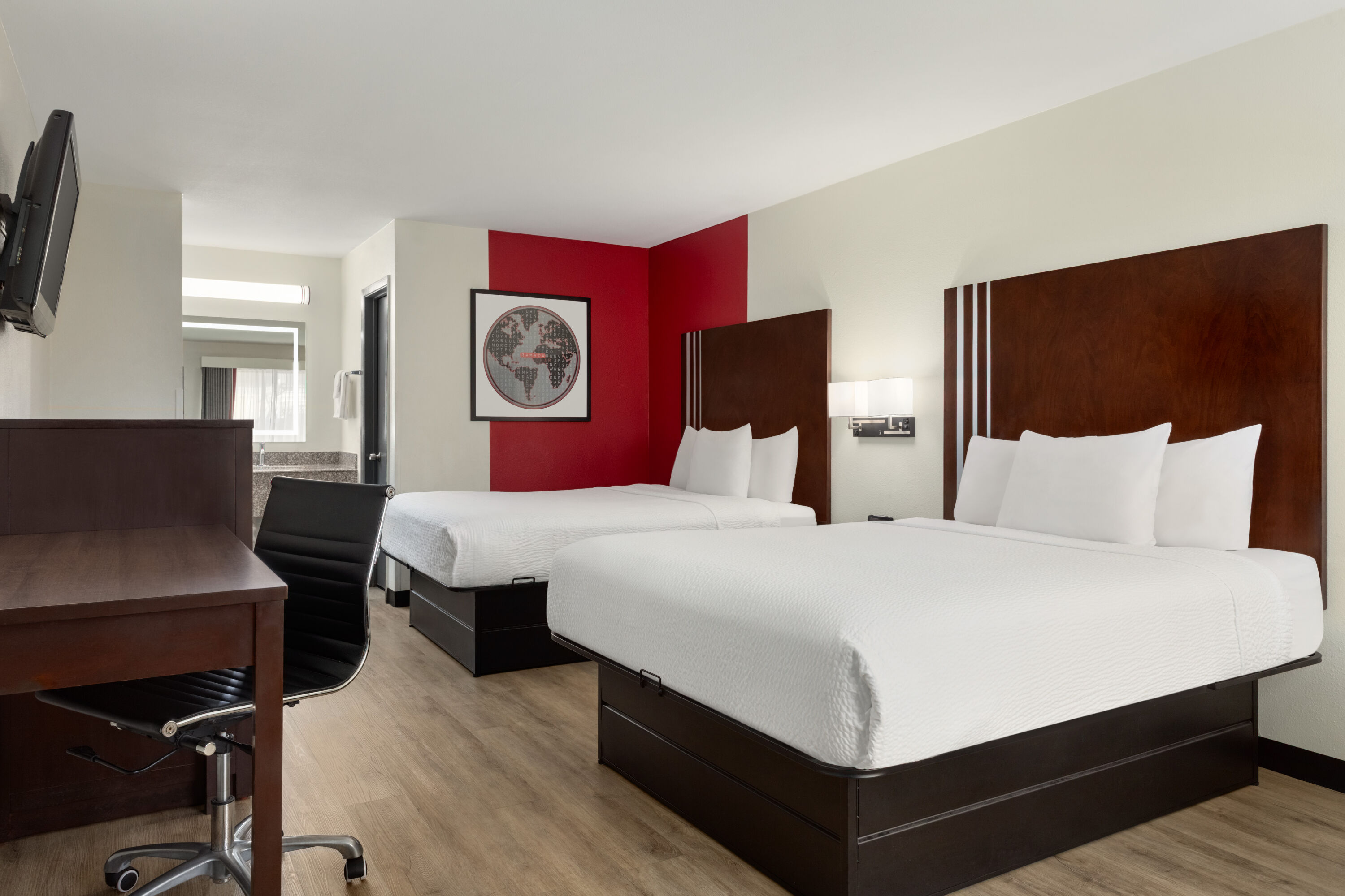 Guest room at the Ramada by Wyndham San Antonio Near SeaWorld/Lackland AFB in San Antonio, Texas