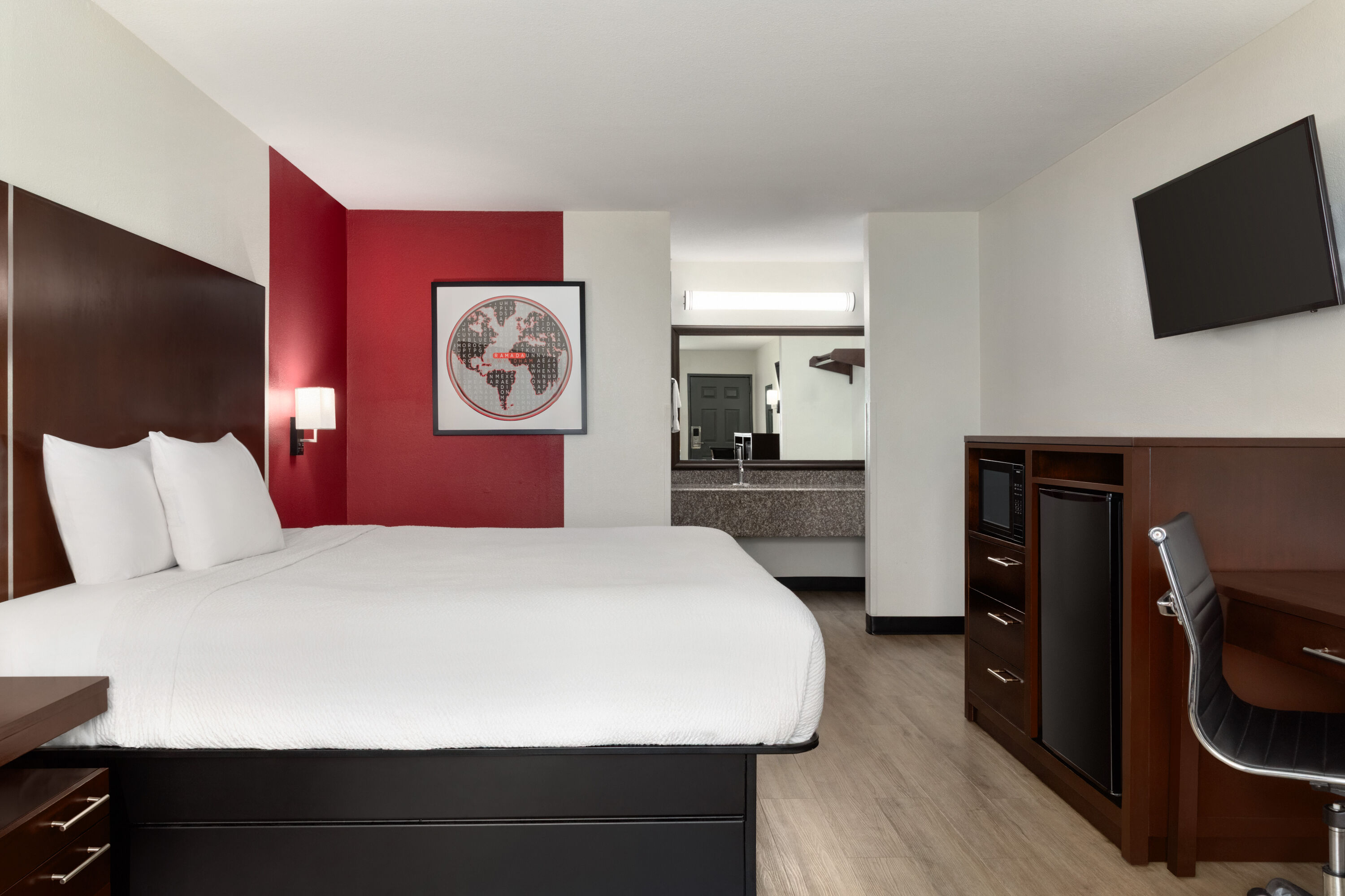 Guest room at the Ramada by Wyndham San Antonio Near SeaWorld/Lackland AFB in San Antonio, Texas
