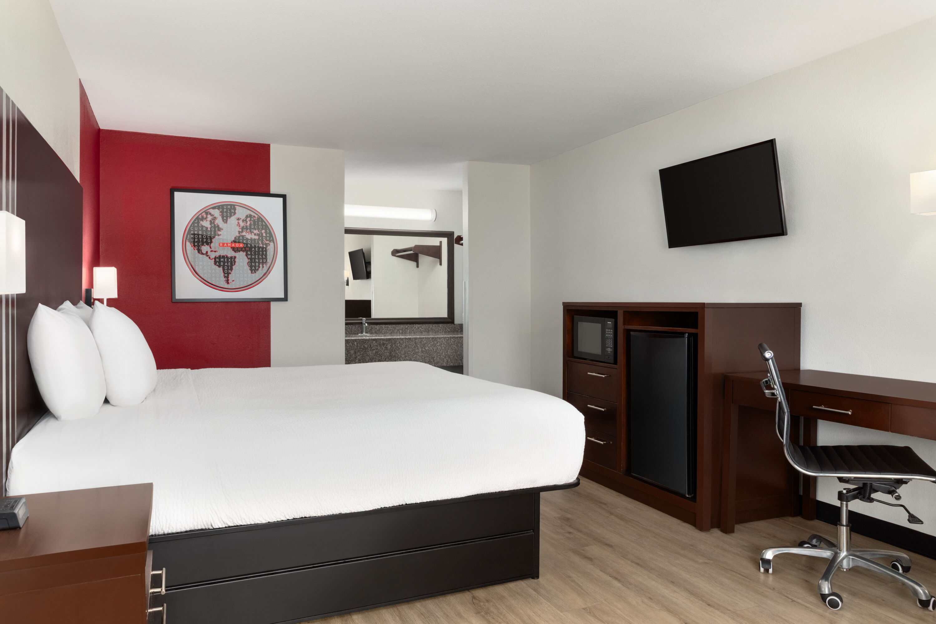 Guest room at the Ramada by Wyndham San Antonio Near SeaWorld/Lackland AFB in San Antonio, Texas
