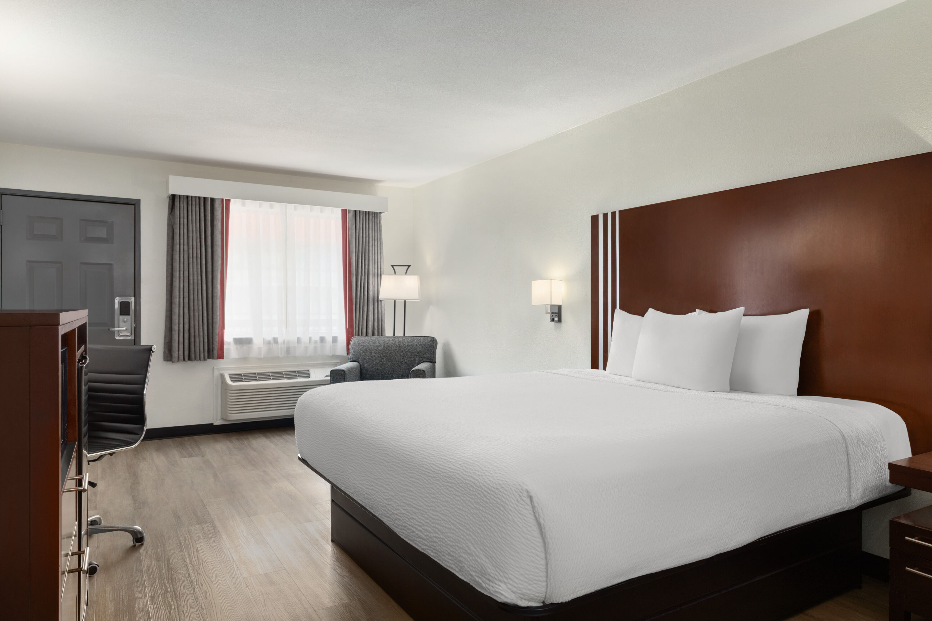Guest room at the Ramada by Wyndham San Antonio Near SeaWorld/Lackland AFB in San Antonio, Texas