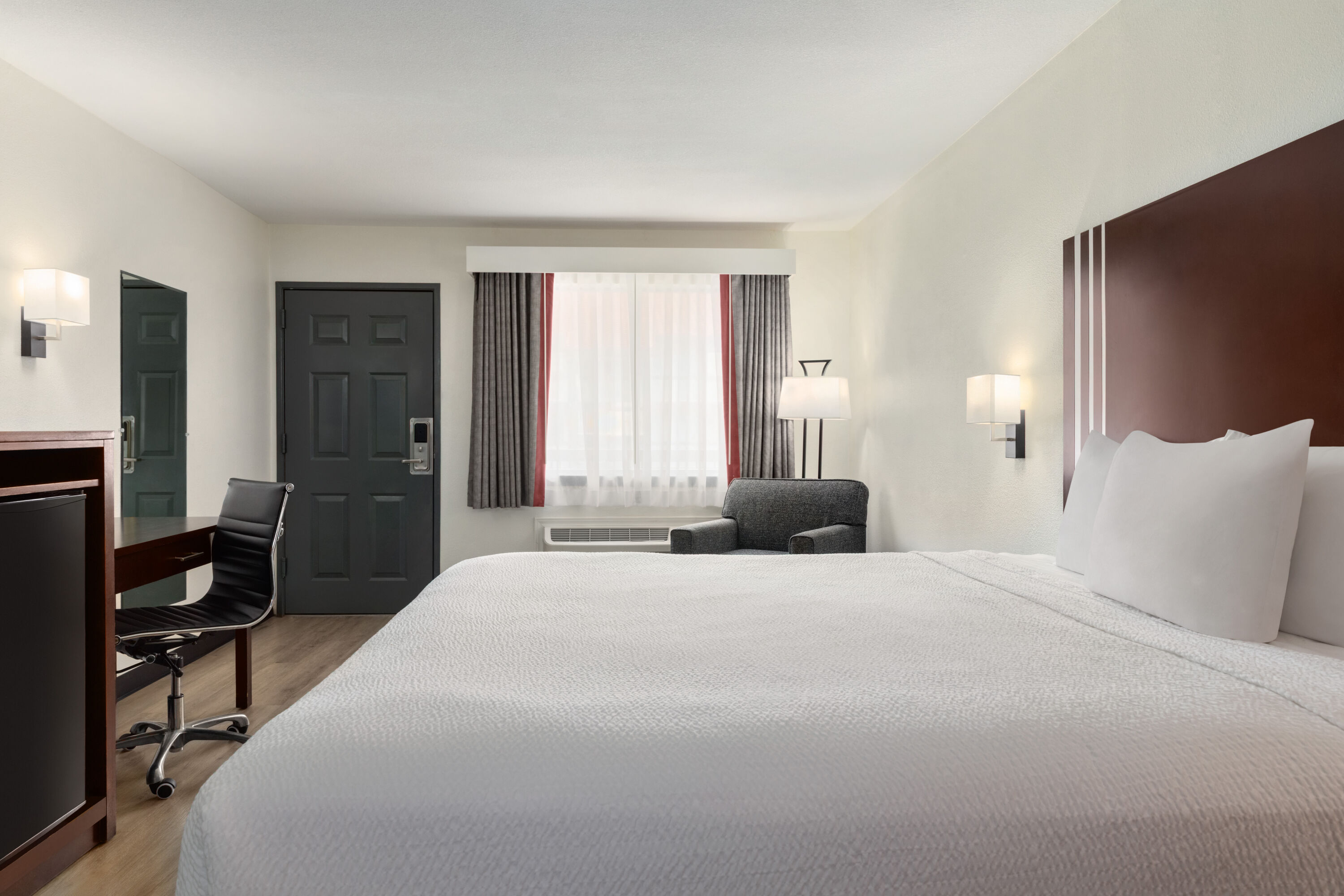 Guest room at the Ramada by Wyndham San Antonio Near SeaWorld/Lackland AFB in San Antonio, Texas