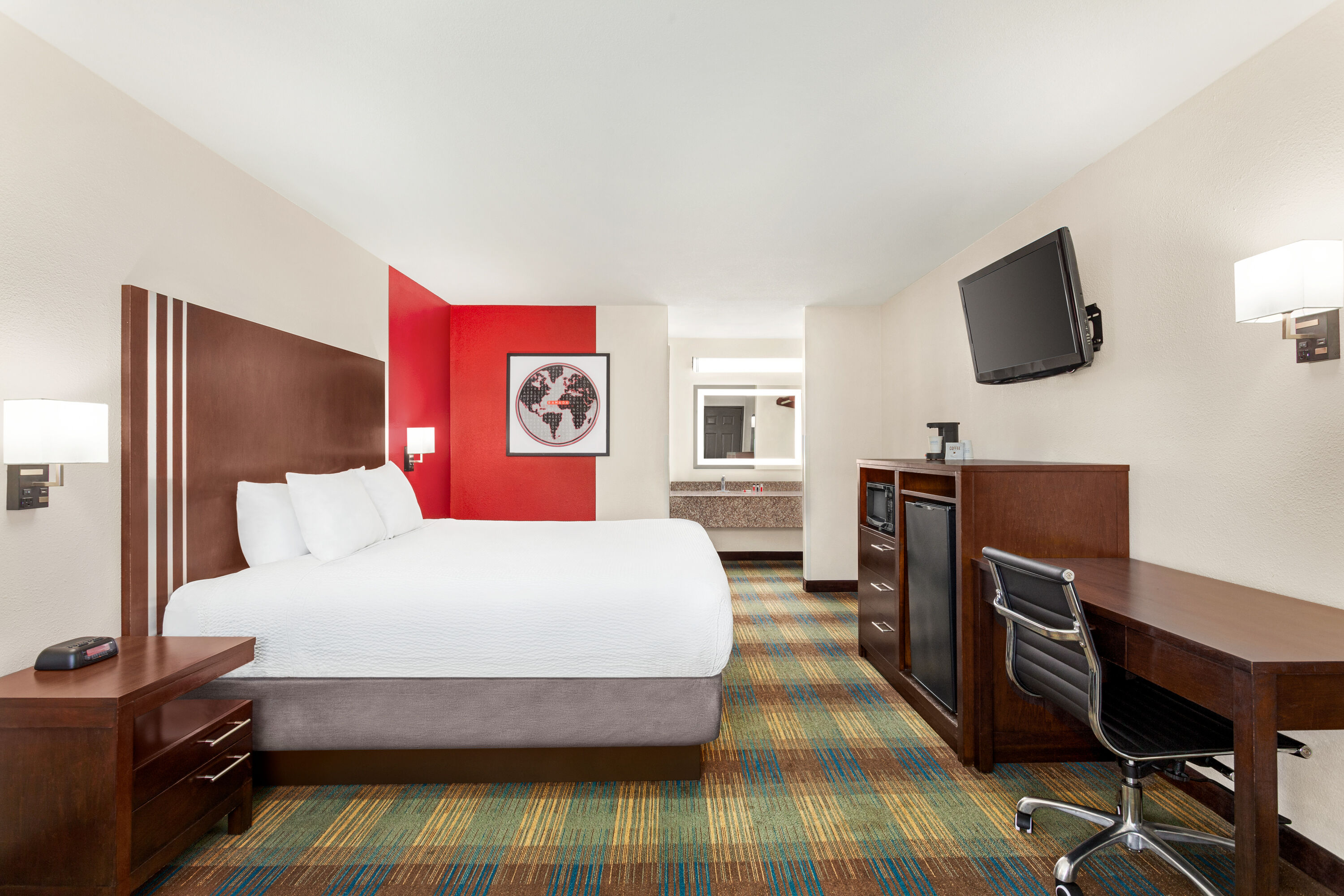 Guest room at the Ramada by Wyndham San Antonio Near SeaWorld/Lackland AFB in San Antonio, Texas