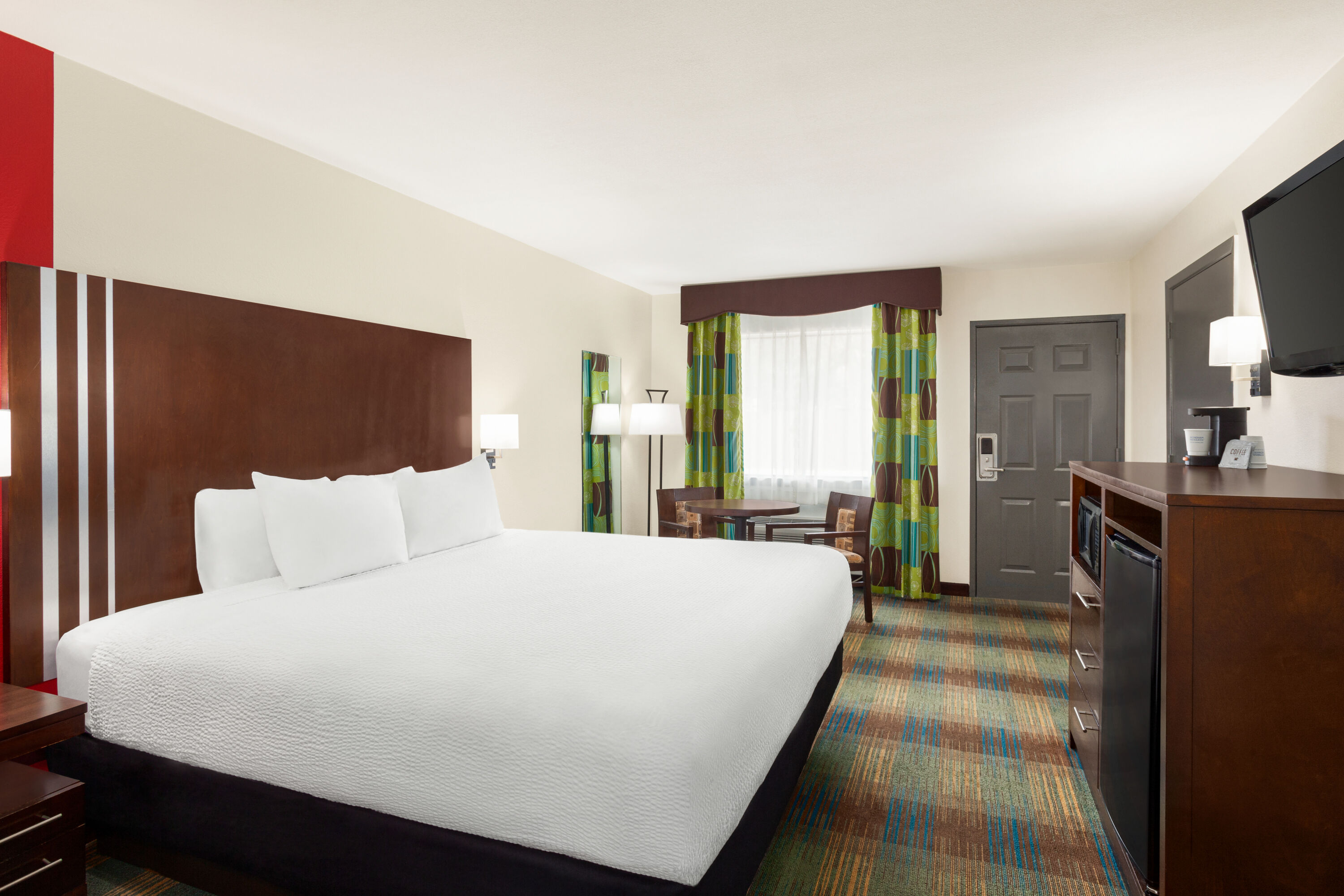Guest room at the Ramada by Wyndham San Antonio Near SeaWorld/Lackland AFB in San Antonio, Texas