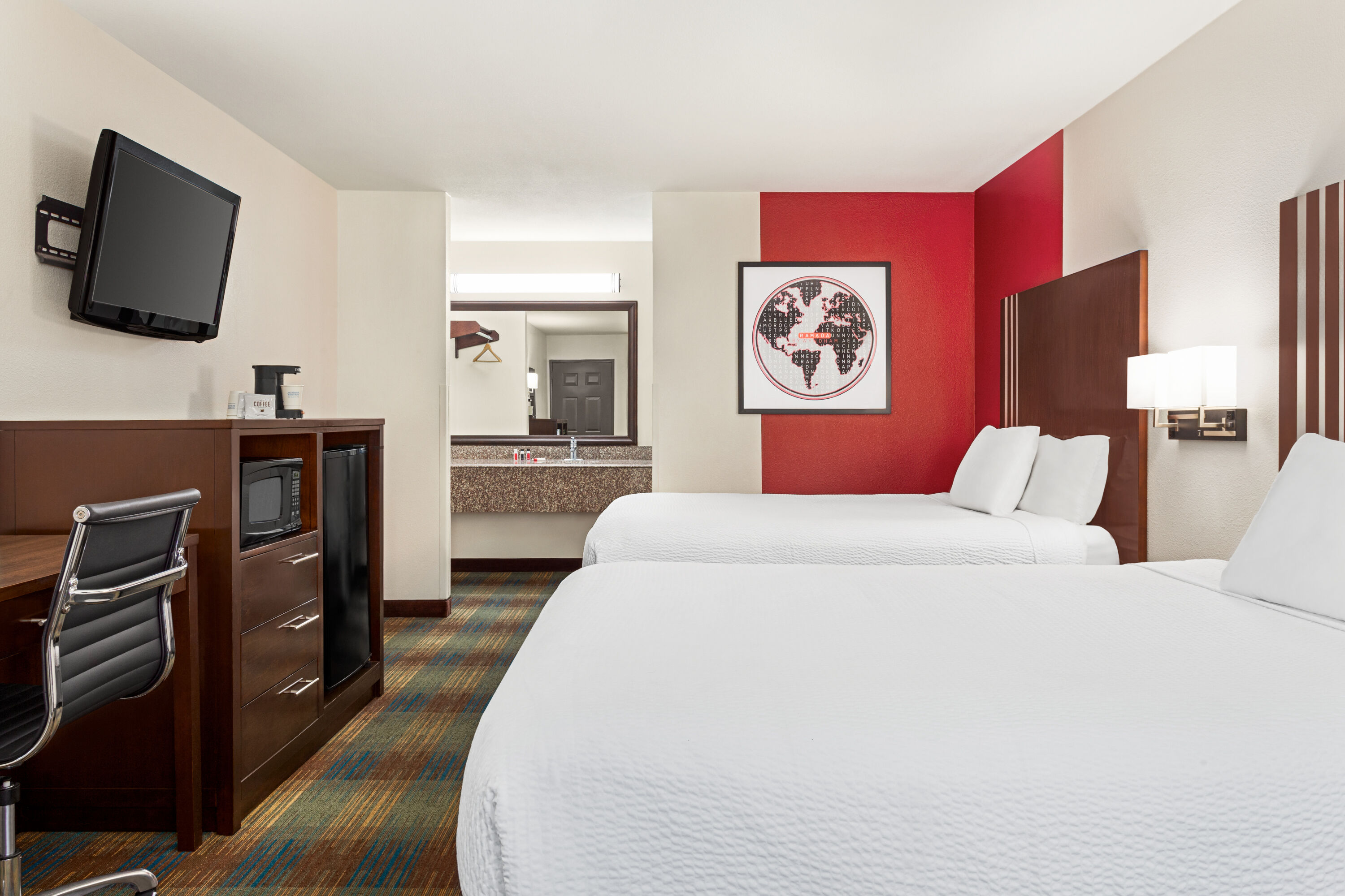 Guest room at the Ramada by Wyndham San Antonio Near SeaWorld/Lackland AFB in San Antonio, Texas