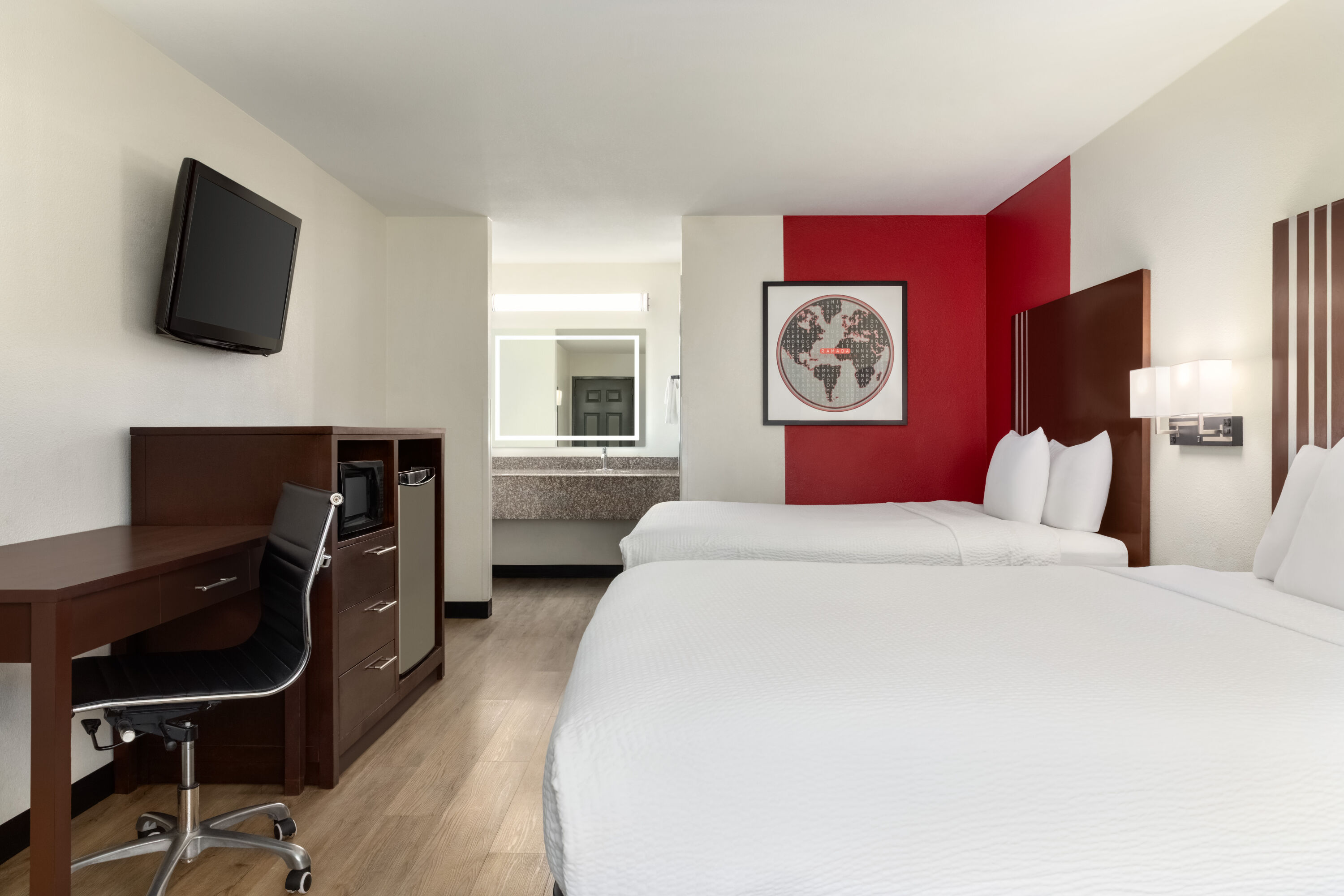 Guest room at the Ramada by Wyndham San Antonio Near SeaWorld/Lackland AFB in San Antonio, Texas