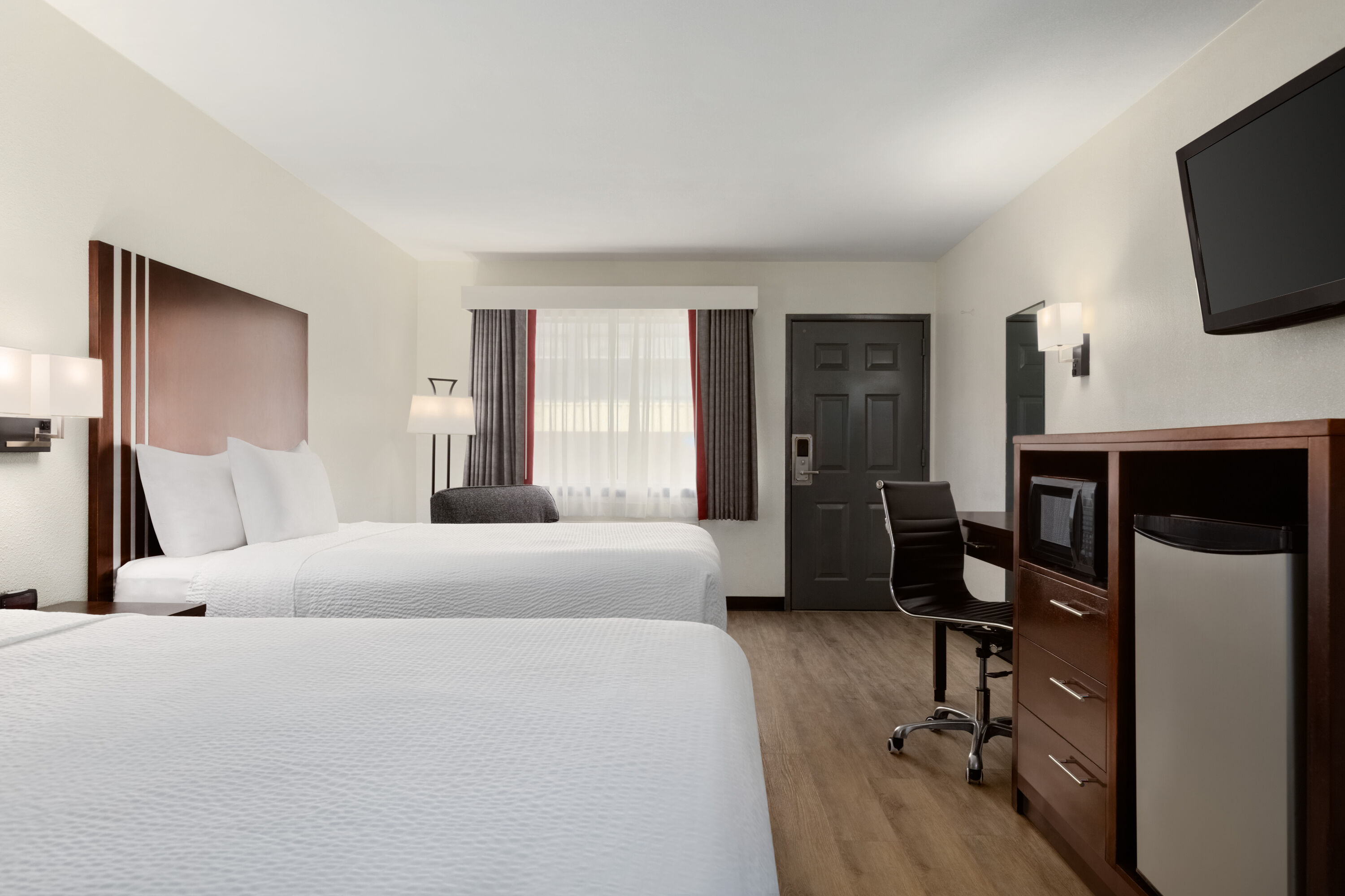 Guest room at the Ramada by Wyndham San Antonio Near SeaWorld/Lackland AFB in San Antonio, Texas