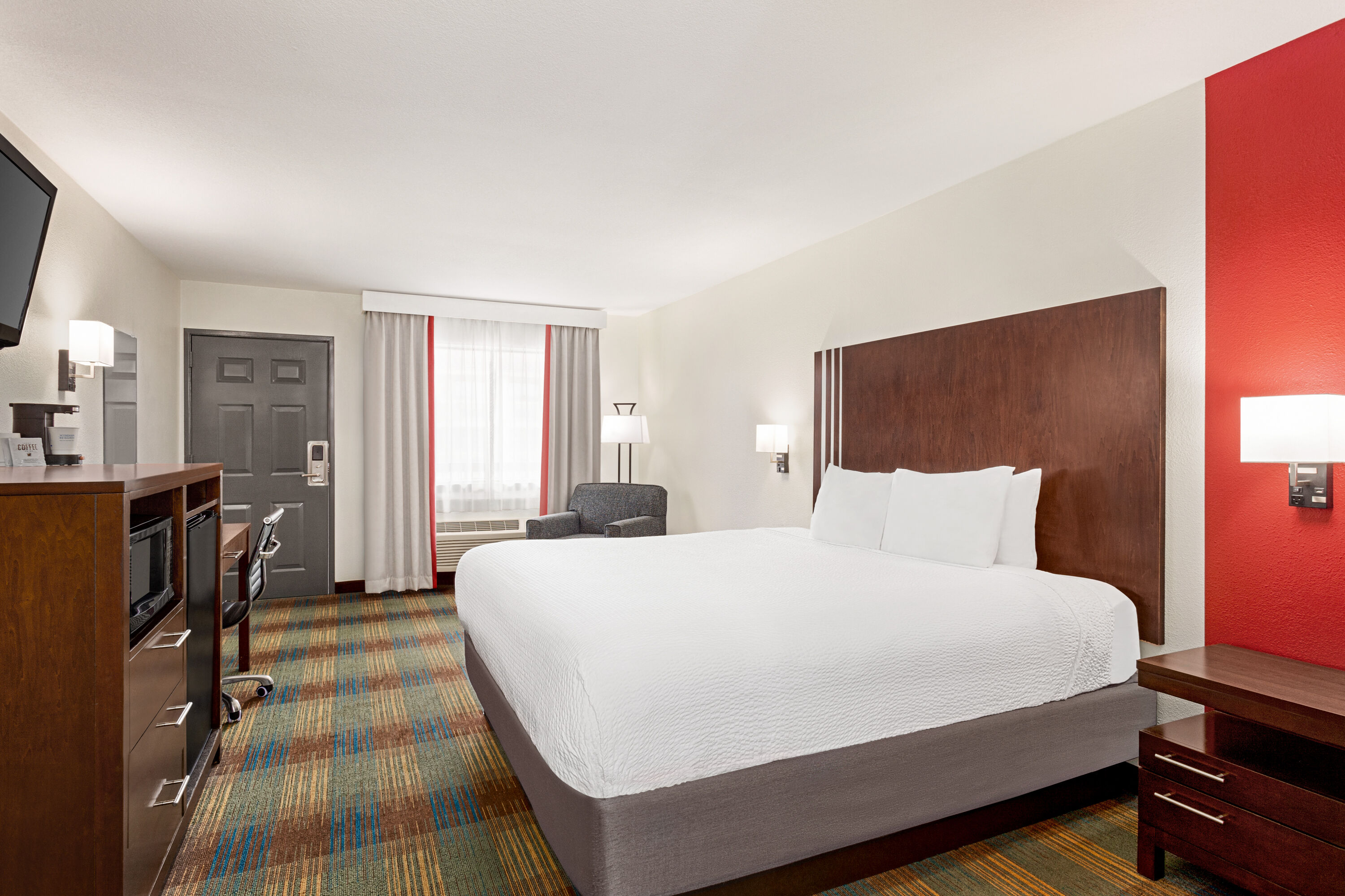 Guest room at the Ramada by Wyndham San Antonio Near SeaWorld/Lackland AFB in San Antonio, Texas