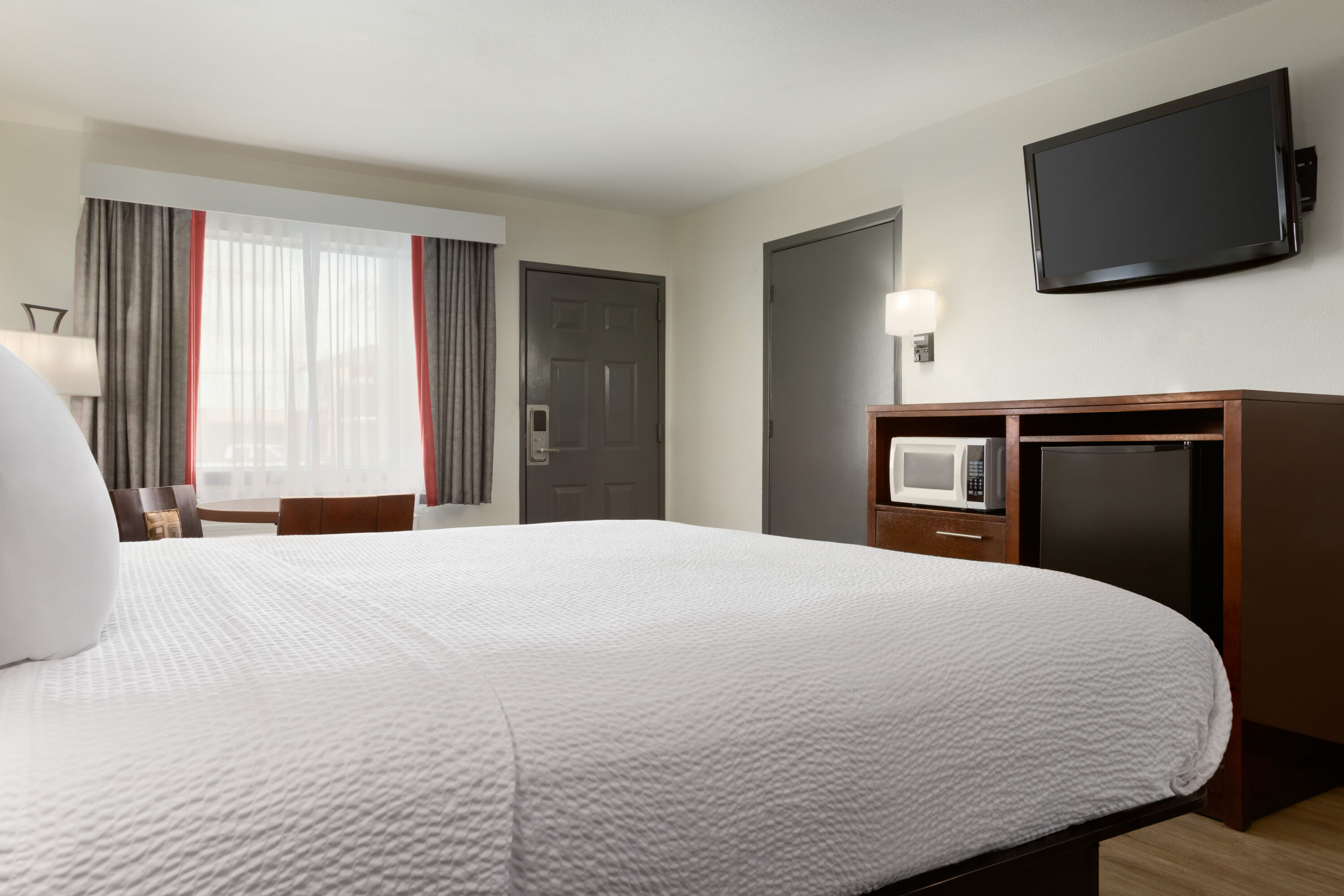 Guest room at the Ramada by Wyndham San Antonio Near SeaWorld/Lackland AFB in San Antonio, Texas