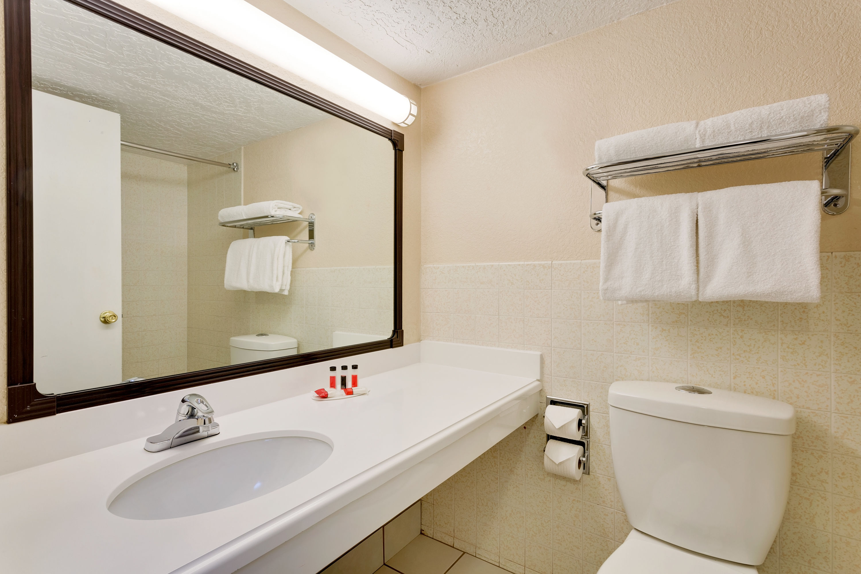 Guest room bath at the Ramada by Wyndham Provo in Provo, Utah