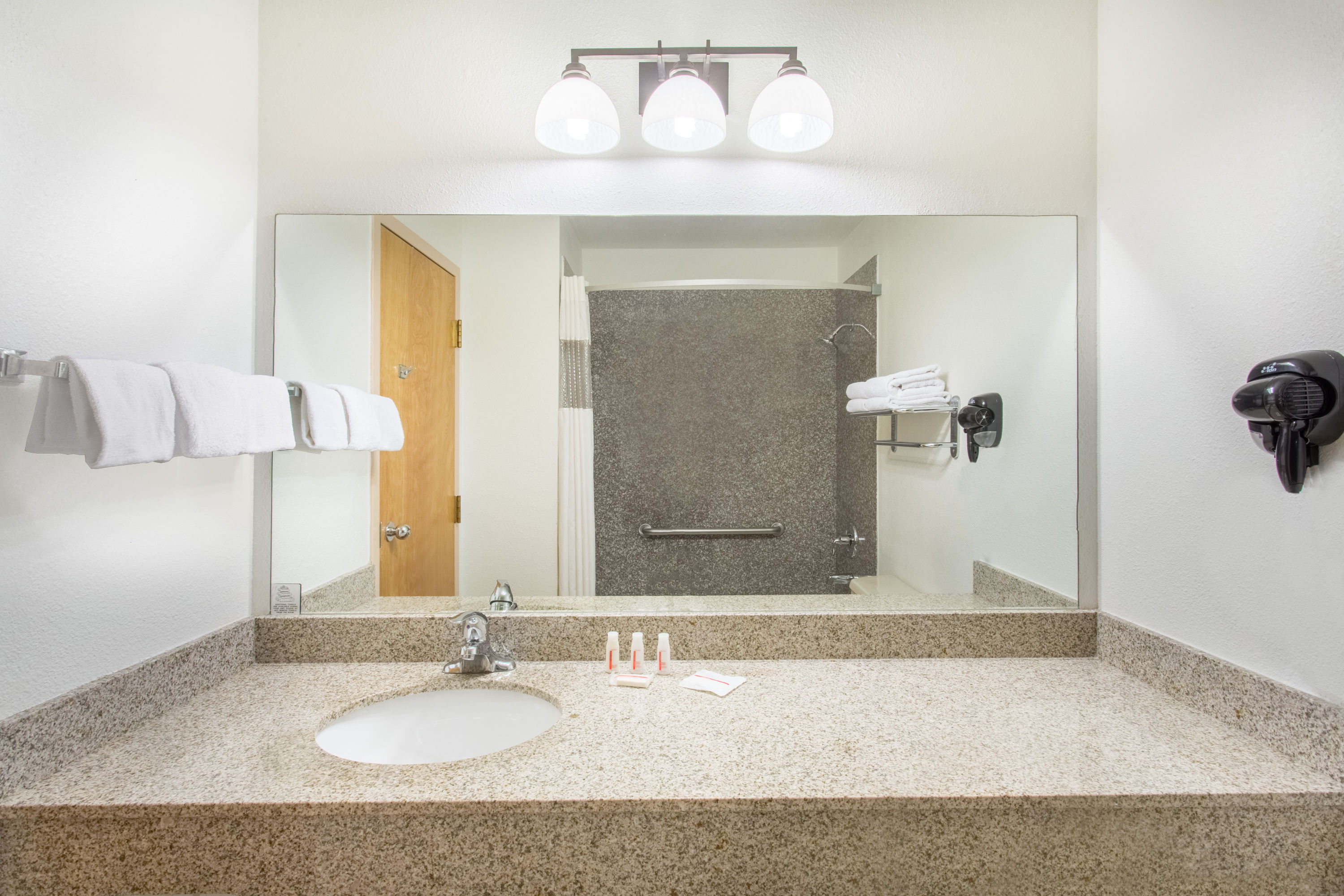Guest room bath at the Ramada by Wyndham St George in Saint George, Utah