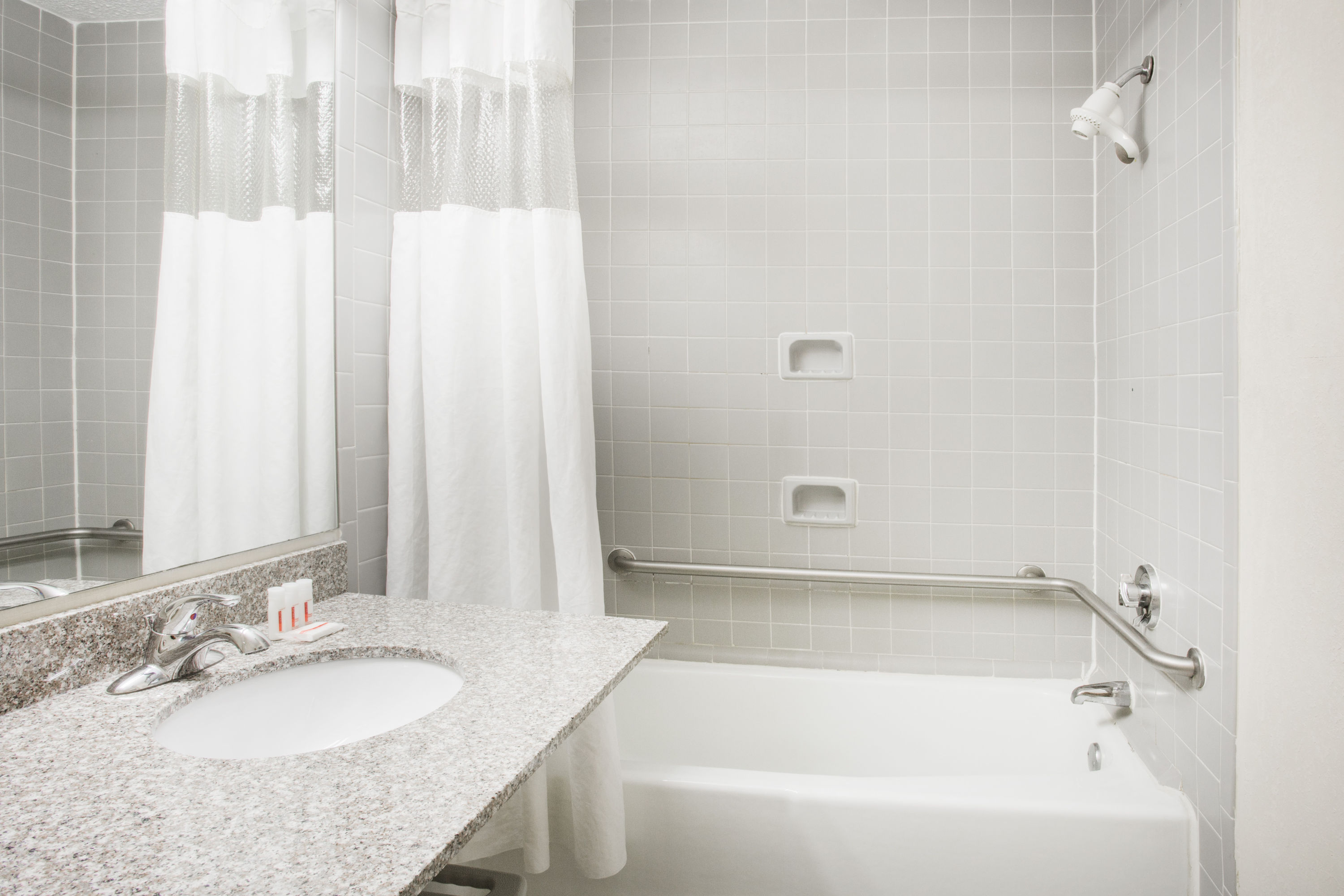 Guest room bath at the Ramada by Wyndham Wytheville in Wytheville, Virginia