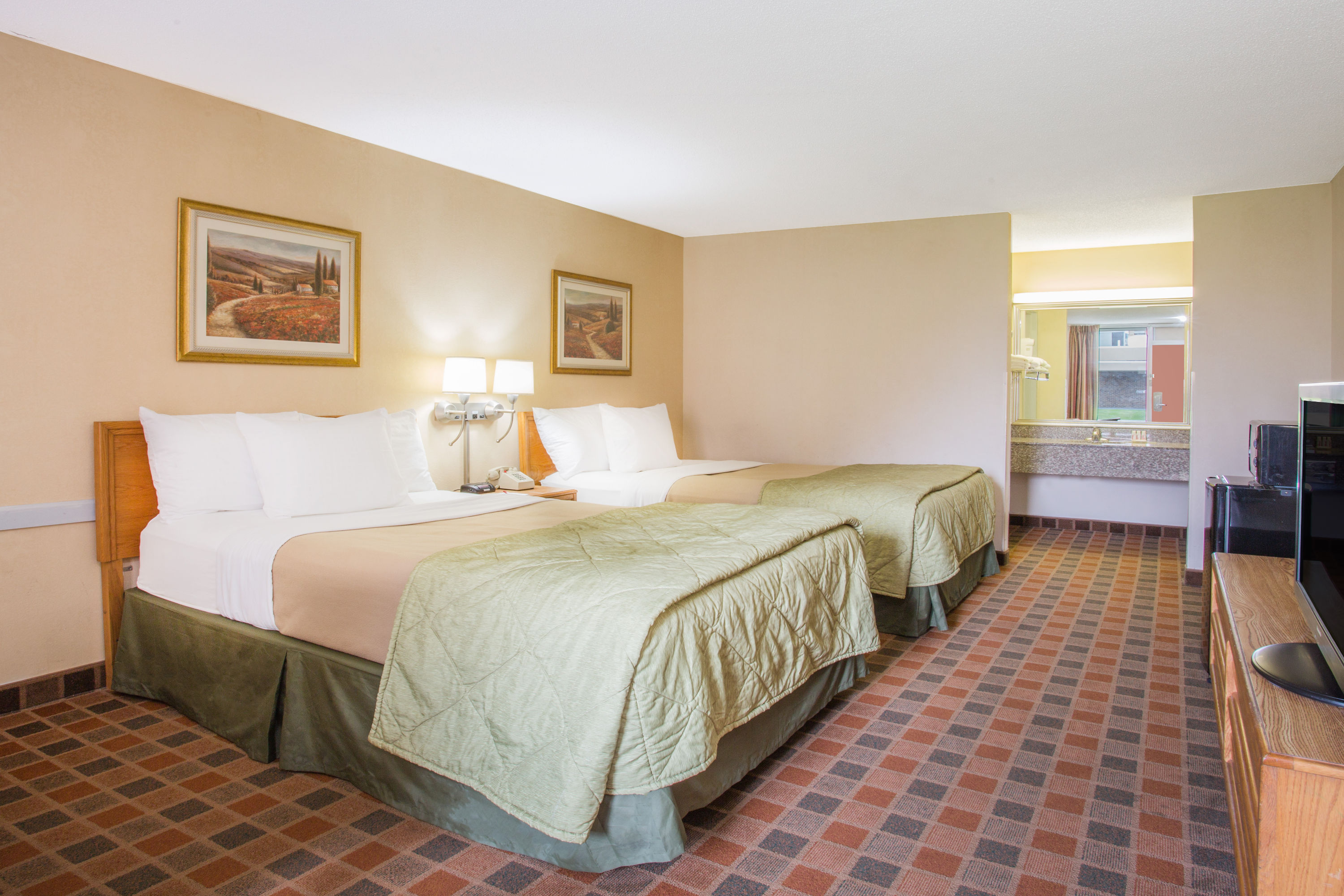 Guest room at the Ramada by Wyndham Wytheville in Wytheville, Virginia