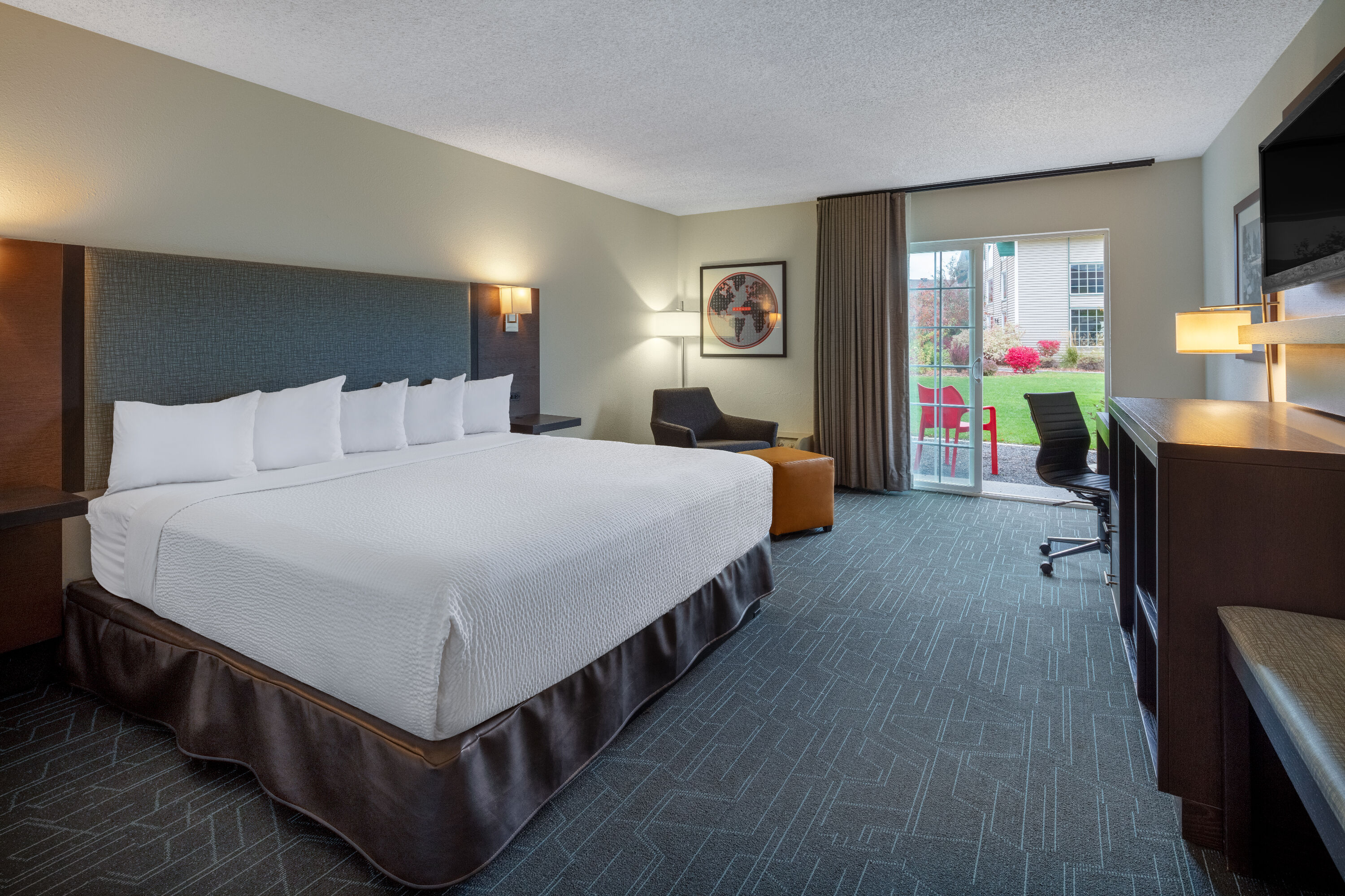 Guest room at the Ramada by Wyndham Spokane Airport in Spokane, Washington