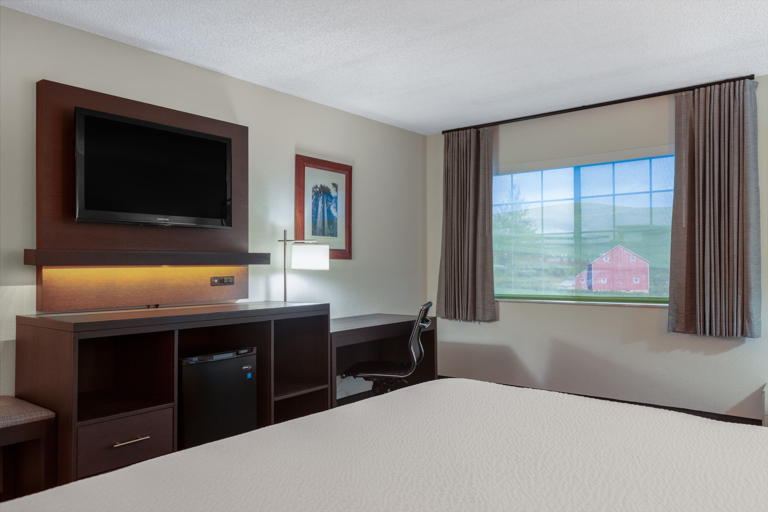 Guest room at the Ramada by Wyndham Spokane Airport in Spokane, Washington