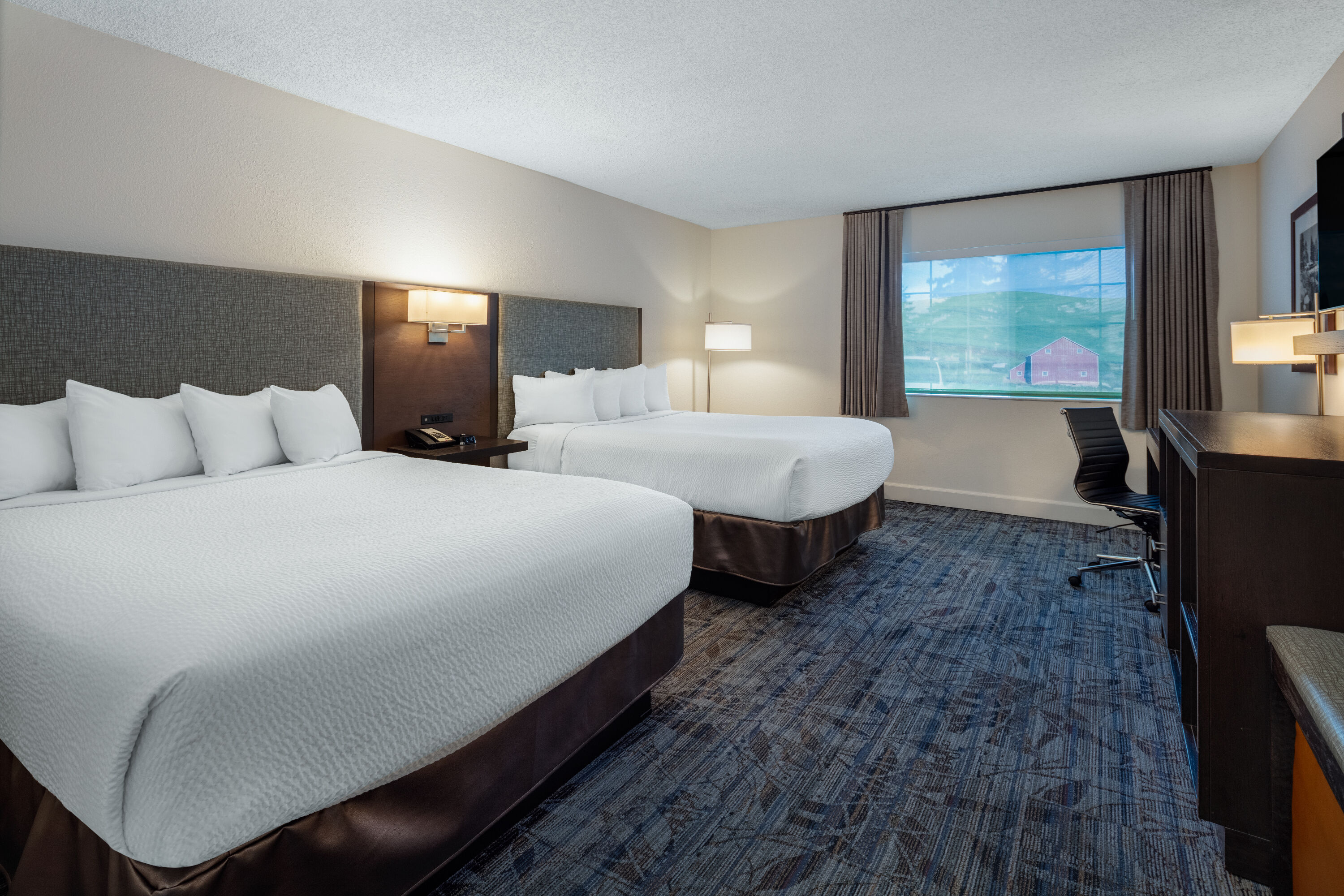 Guest room at the Ramada by Wyndham Spokane Airport in Spokane, Washington