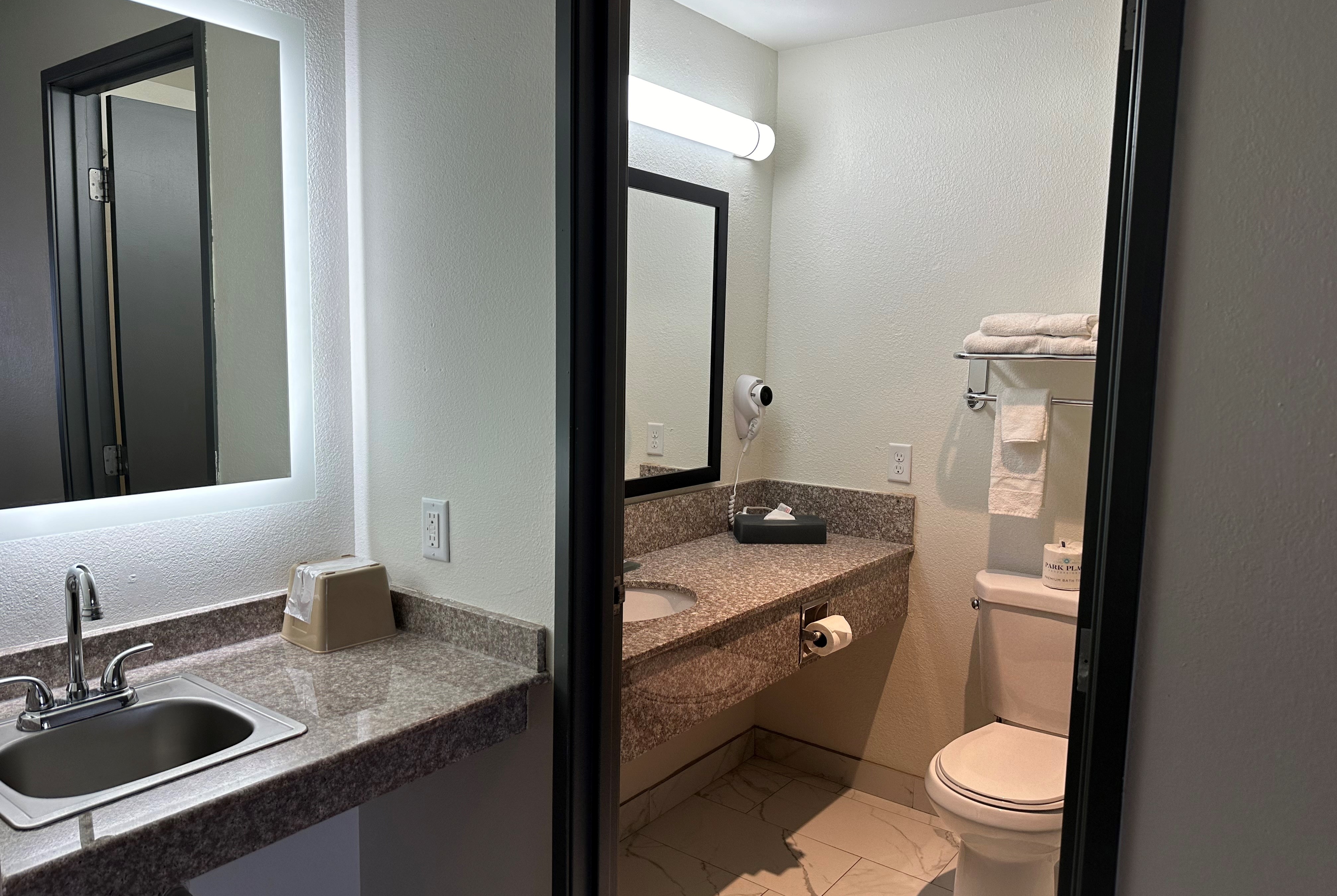 Guest room bath at the Ramada by Wyndham Waupaca in Waupaca, Wisconsin