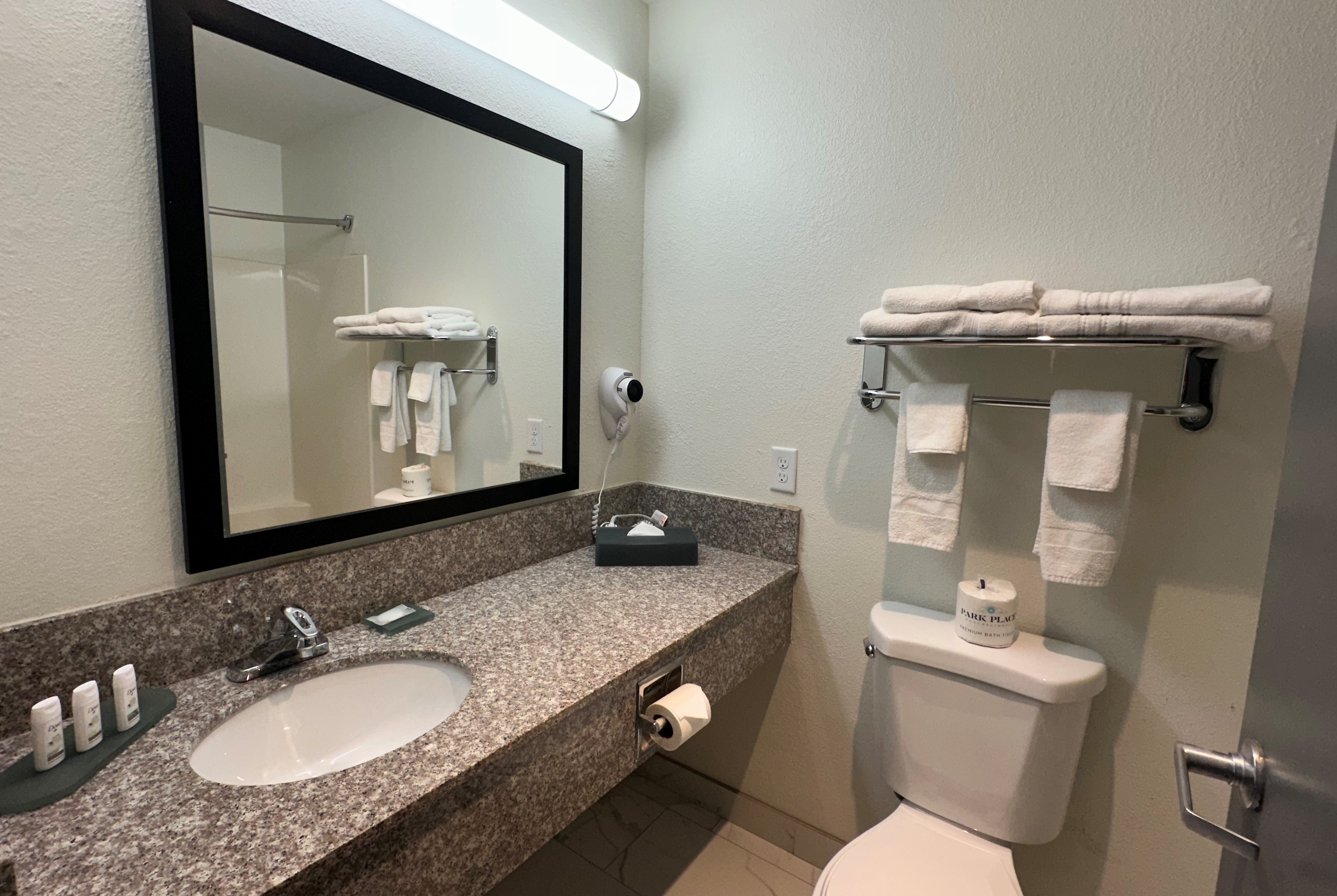 Guest room bath at the Ramada by Wyndham Waupaca in Waupaca, Wisconsin