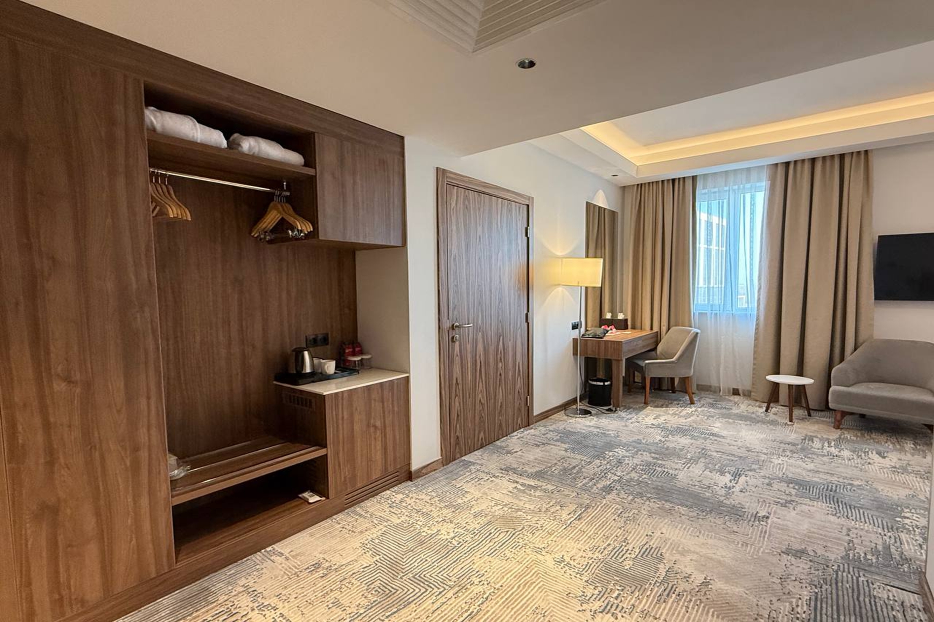 Guest room at the Ramada Encore by Wyndham Bukhara in Bukhara, Other than US/Canada