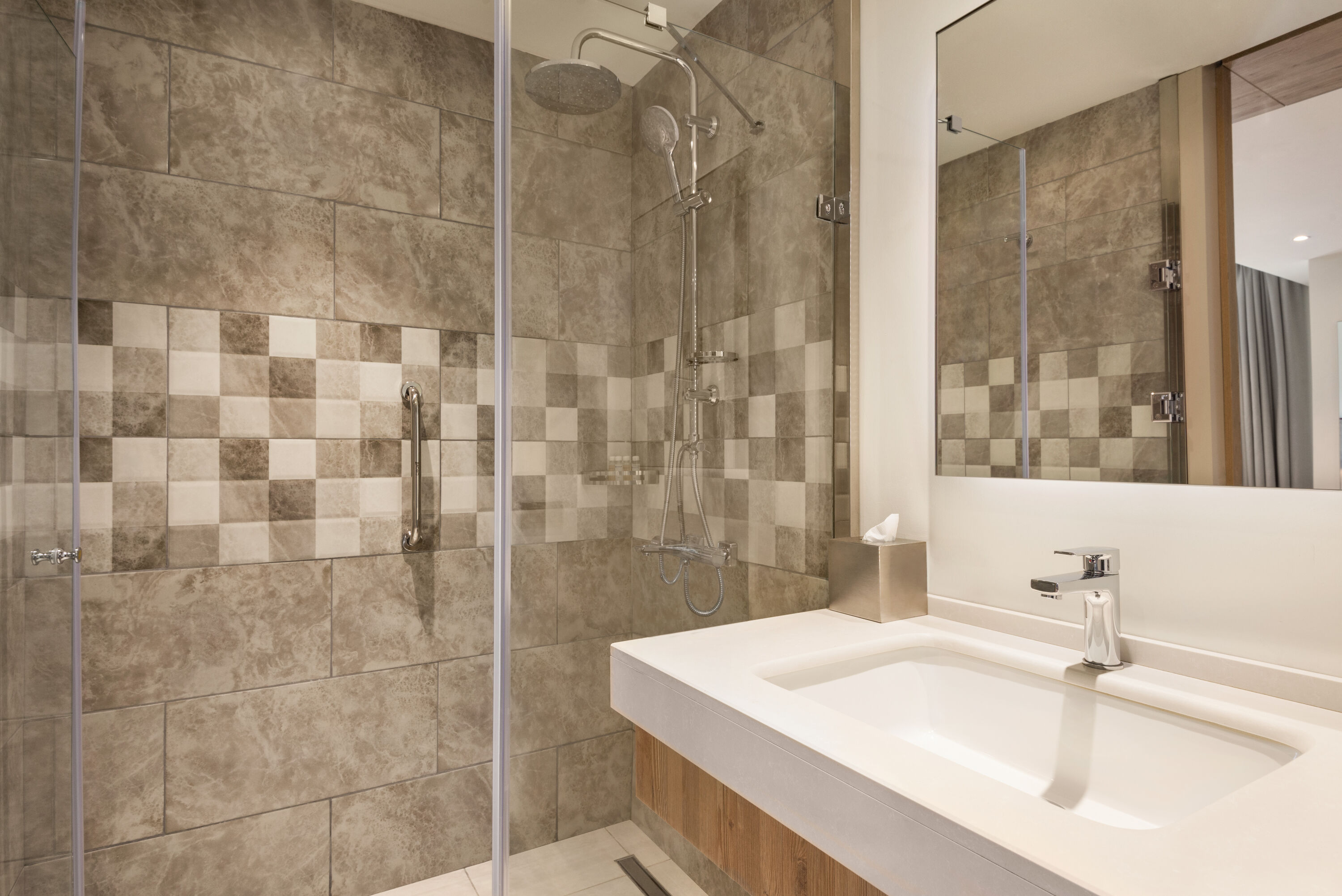 Guest room bath at the Ramada Encore by Wyndham Zomin in Sufa Zaamin District, Other than US/Canada