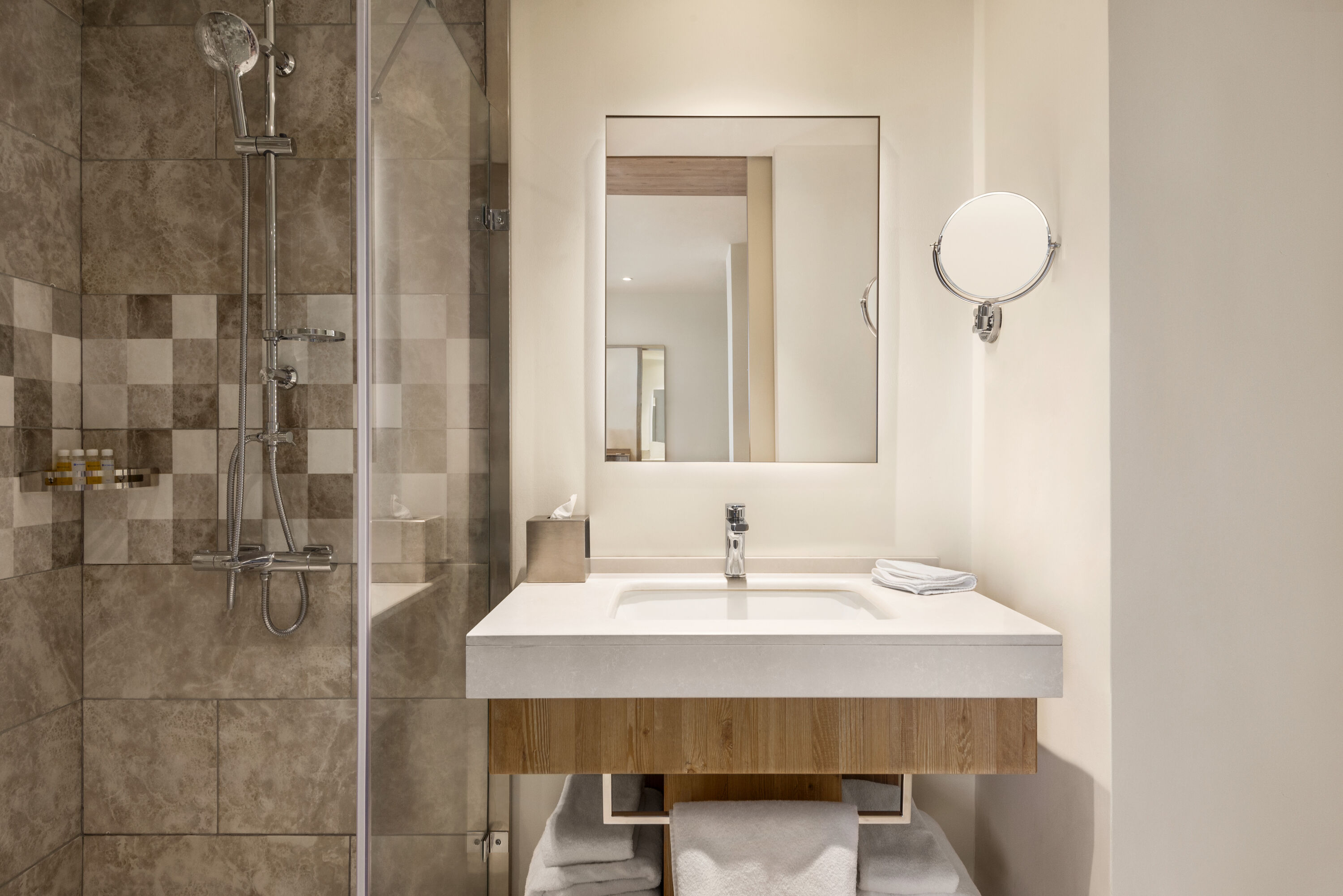 Guest room bath at the Ramada Encore by Wyndham Zomin in Sufa Zaamin District, Other than US/Canada